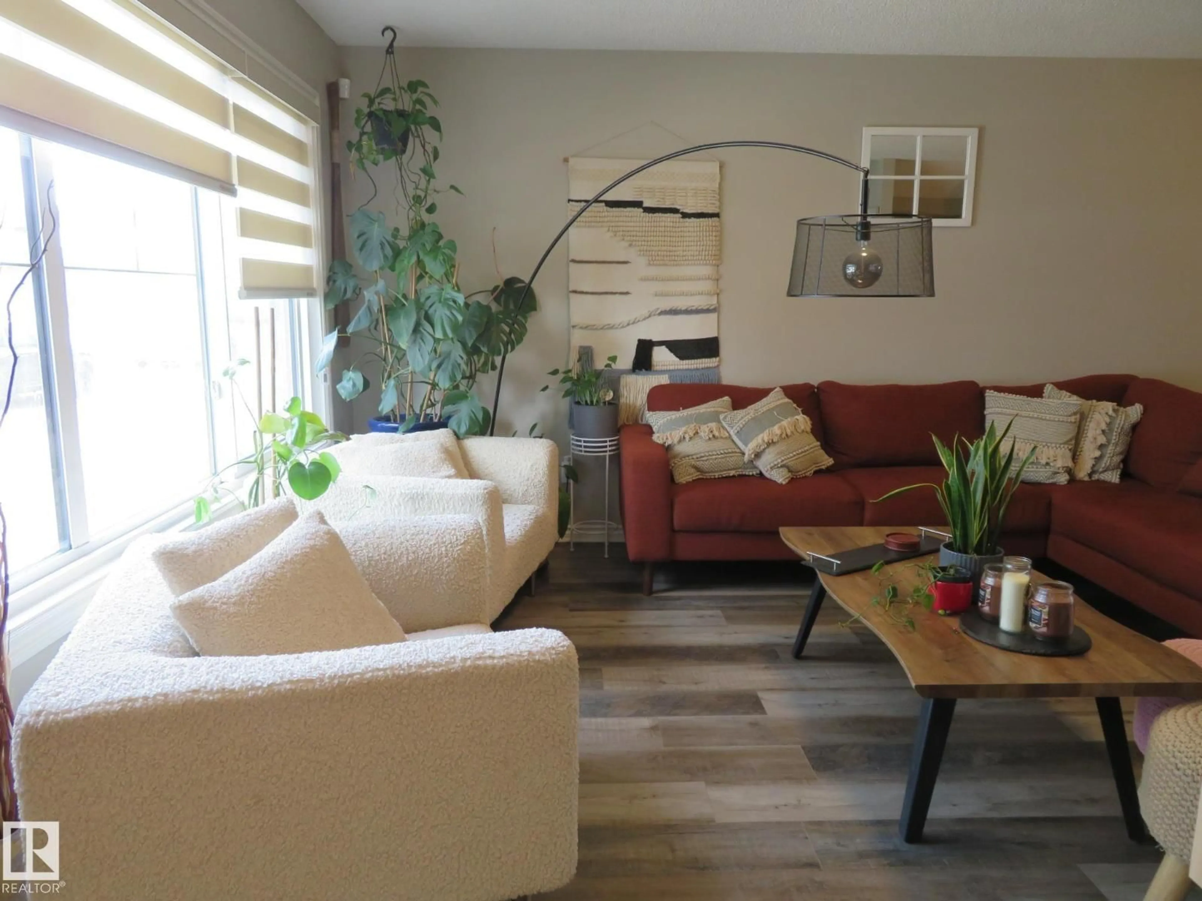 Living room with furniture, wood/laminate floor for 5361 ADMIRAL GIROUARD ST, Edmonton Alberta T5E6X5