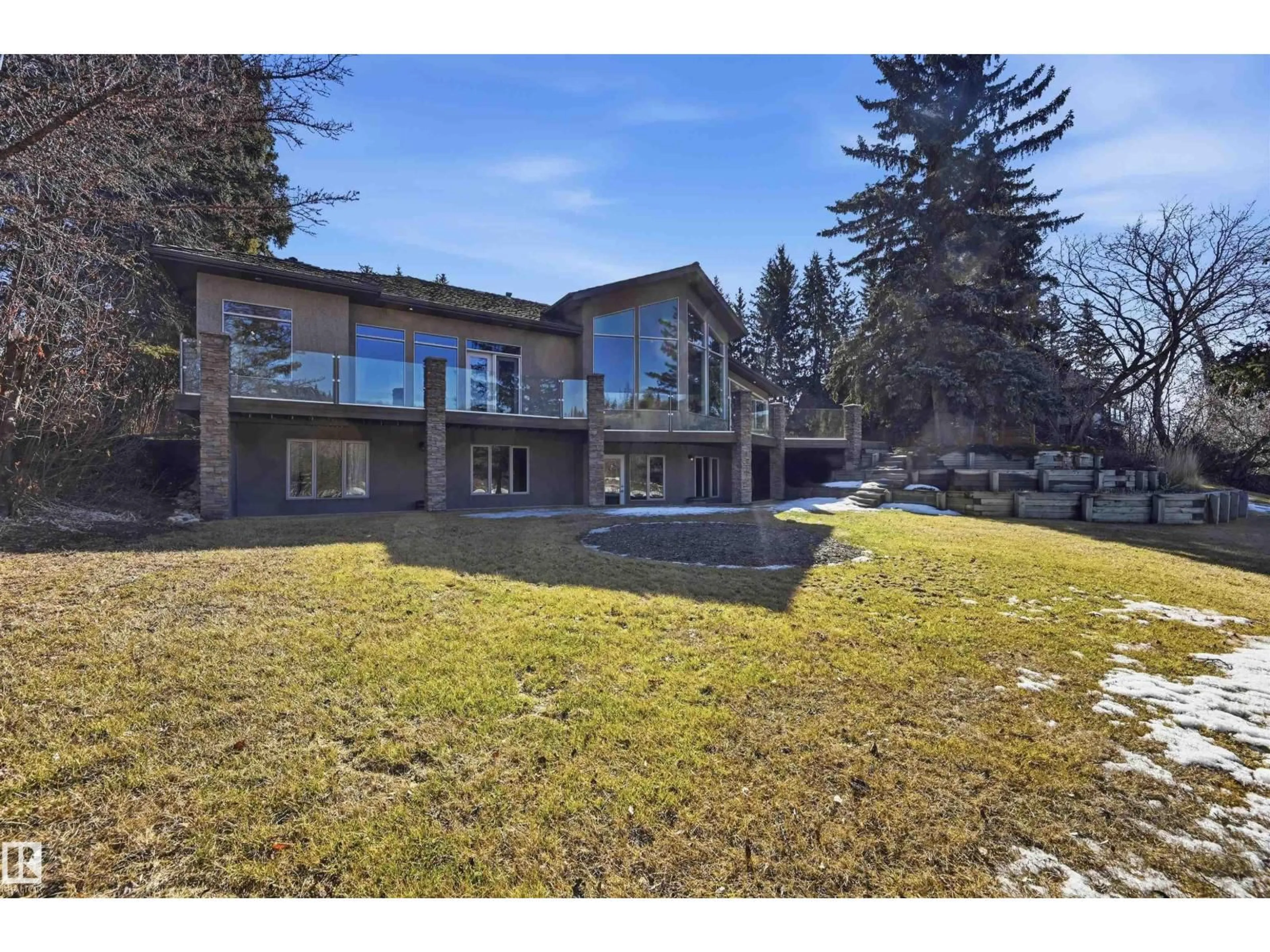 A pic from outside/outdoor area/front of a property/back of a property/a pic from drone, mountain view for 15625 WHITEMUD RD, Edmonton Alberta T6H4N5