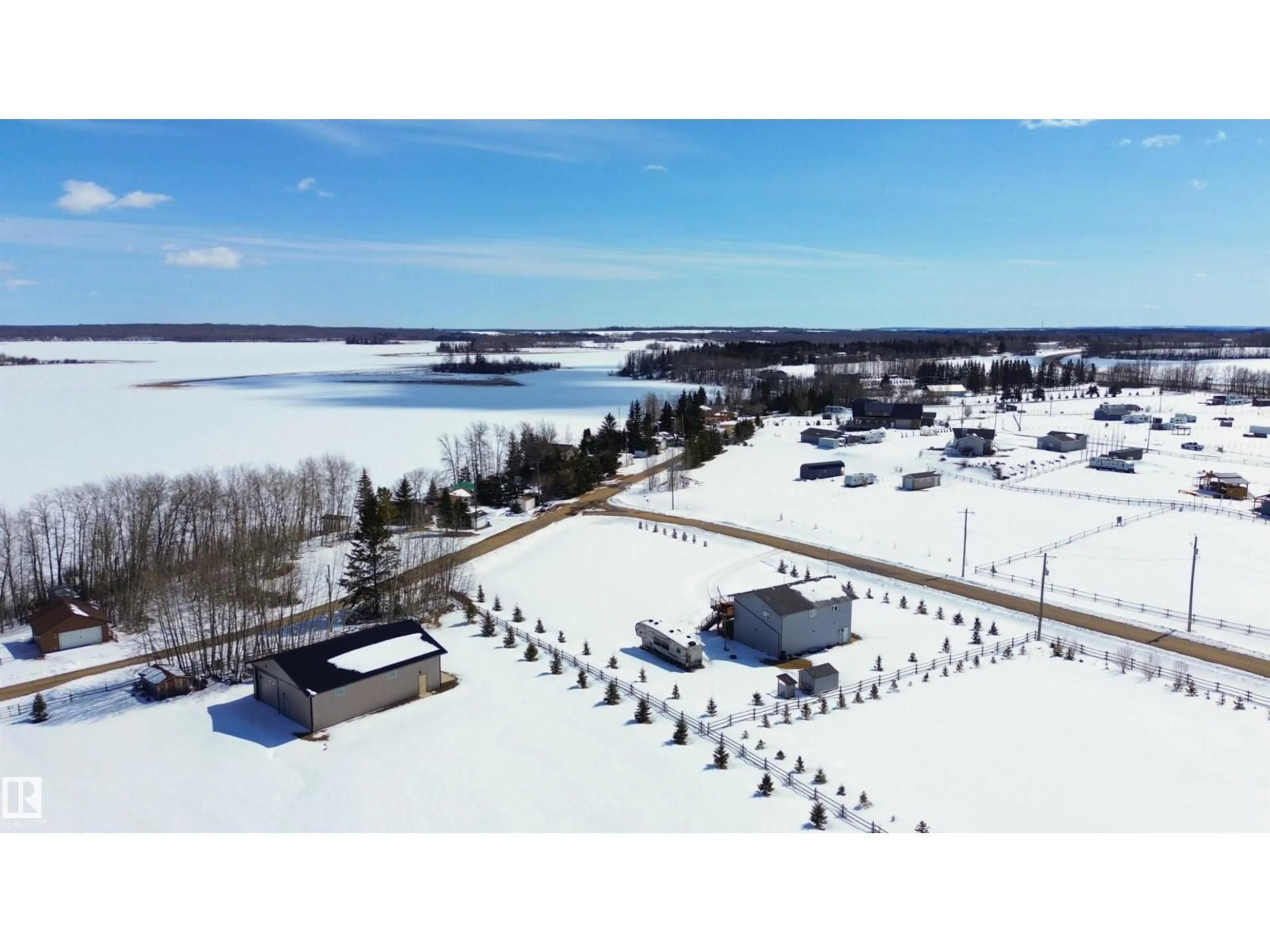 A pic from outside/outdoor area/front of a property/back of a property/a pic from drone, water/lake/river/ocean view for 2 IRENE AVENUE, Rural Athabasca County Alberta T9S1S2