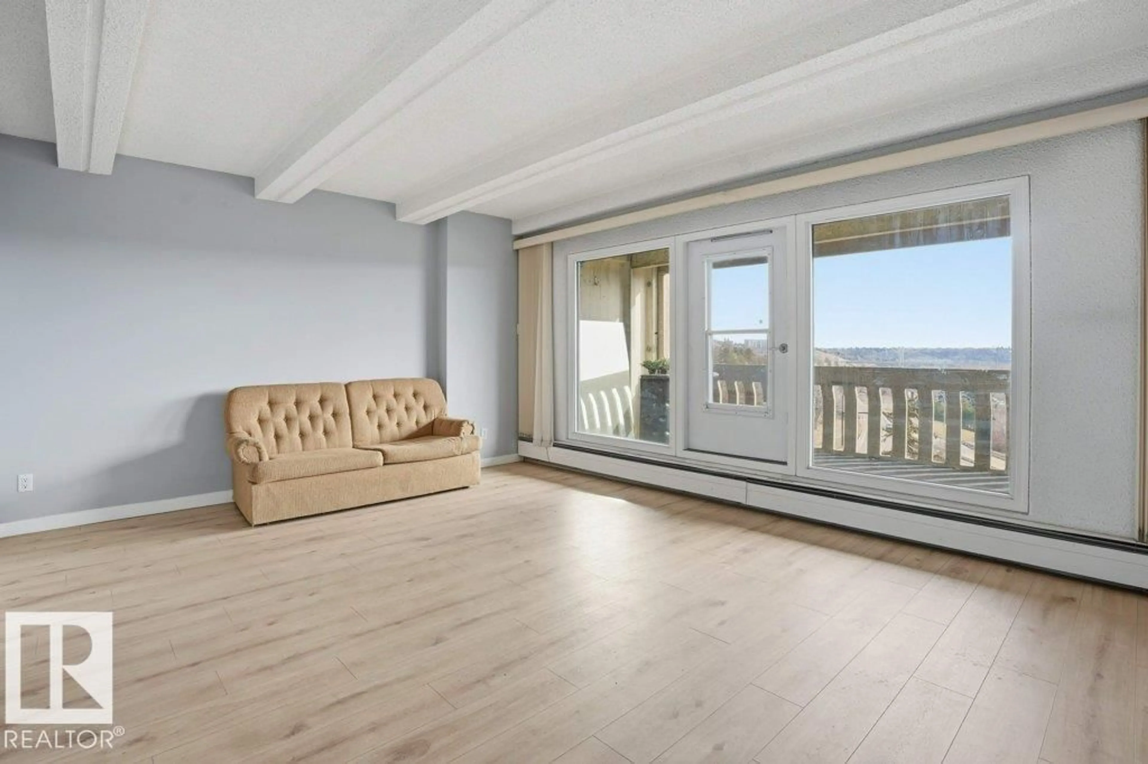 Living room with furniture, wood/laminate floor for #604 - 9918 101 ST, Edmonton Alberta T5K2L1