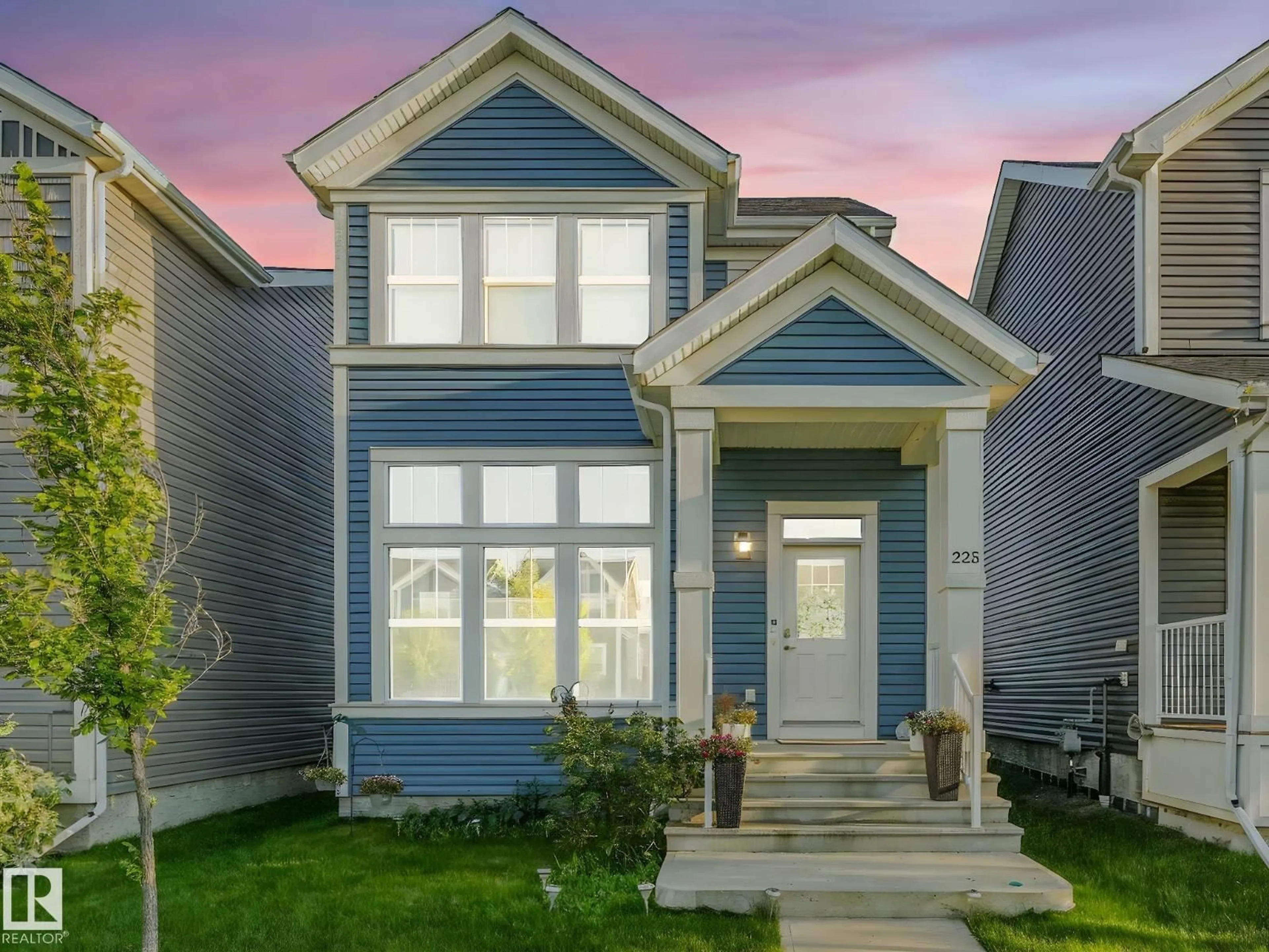 Home with vinyl exterior material, street for 225 SOUTHFORK DR, Leduc Alberta T9E1G3