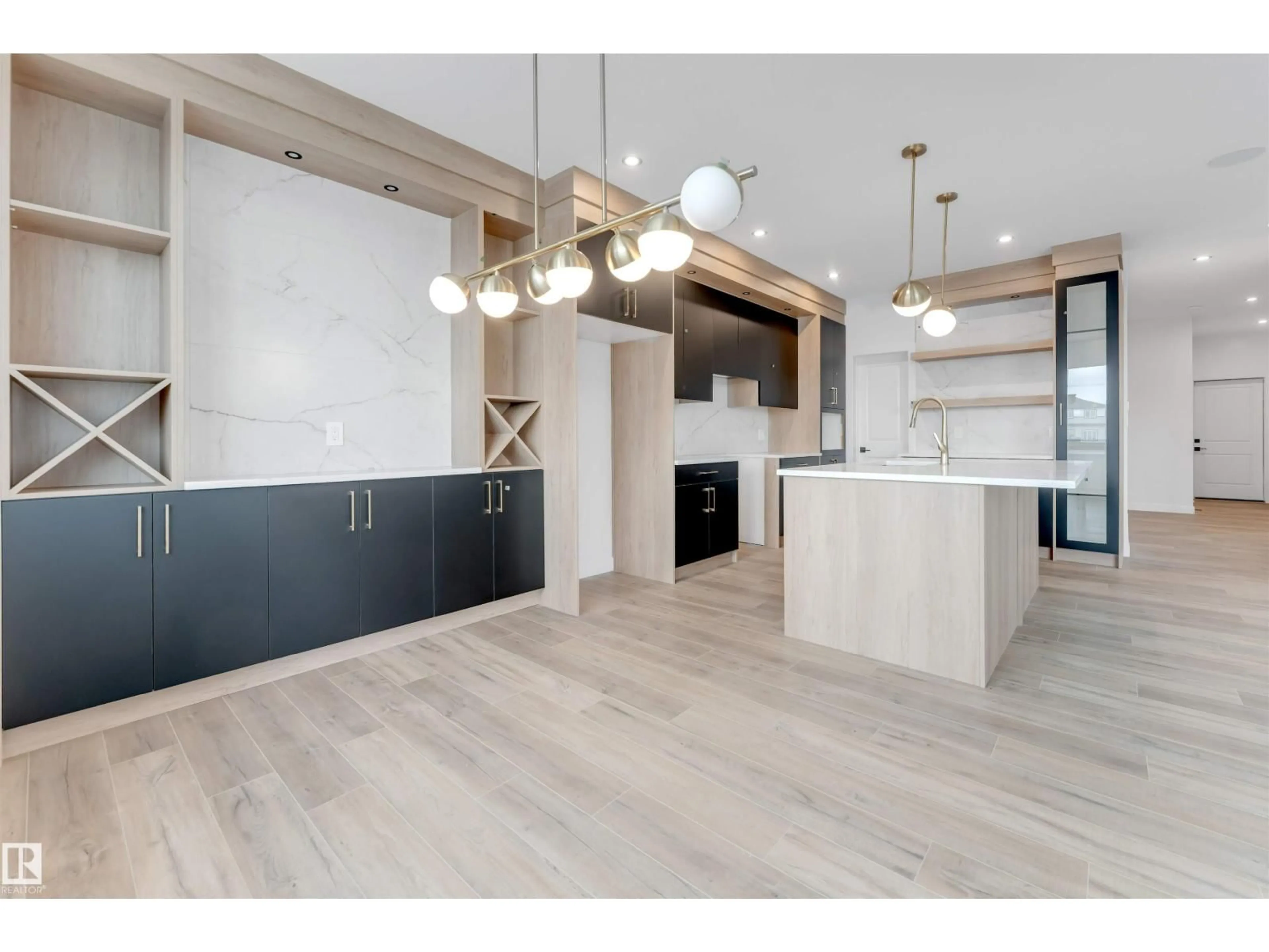 Open concept kitchen, wood/laminate floor for 22 MEADOWGROVE LD, Spruce Grove Alberta T7X1W6