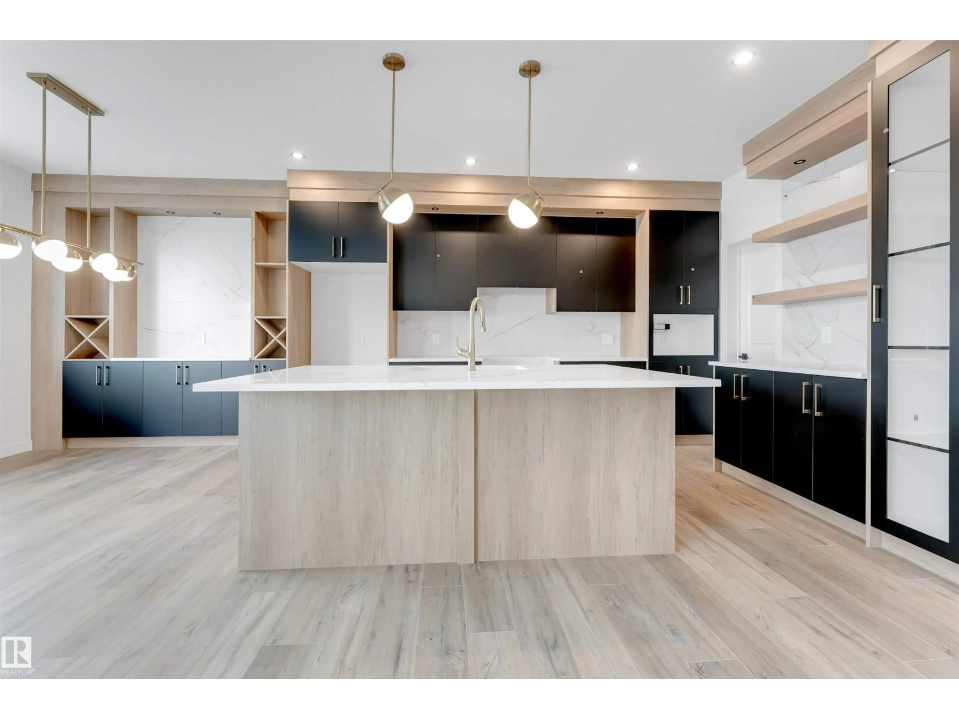 Open concept kitchen, wood/laminate floor for 22 MEADOWGROVE LD, Spruce Grove Alberta T7X1W6