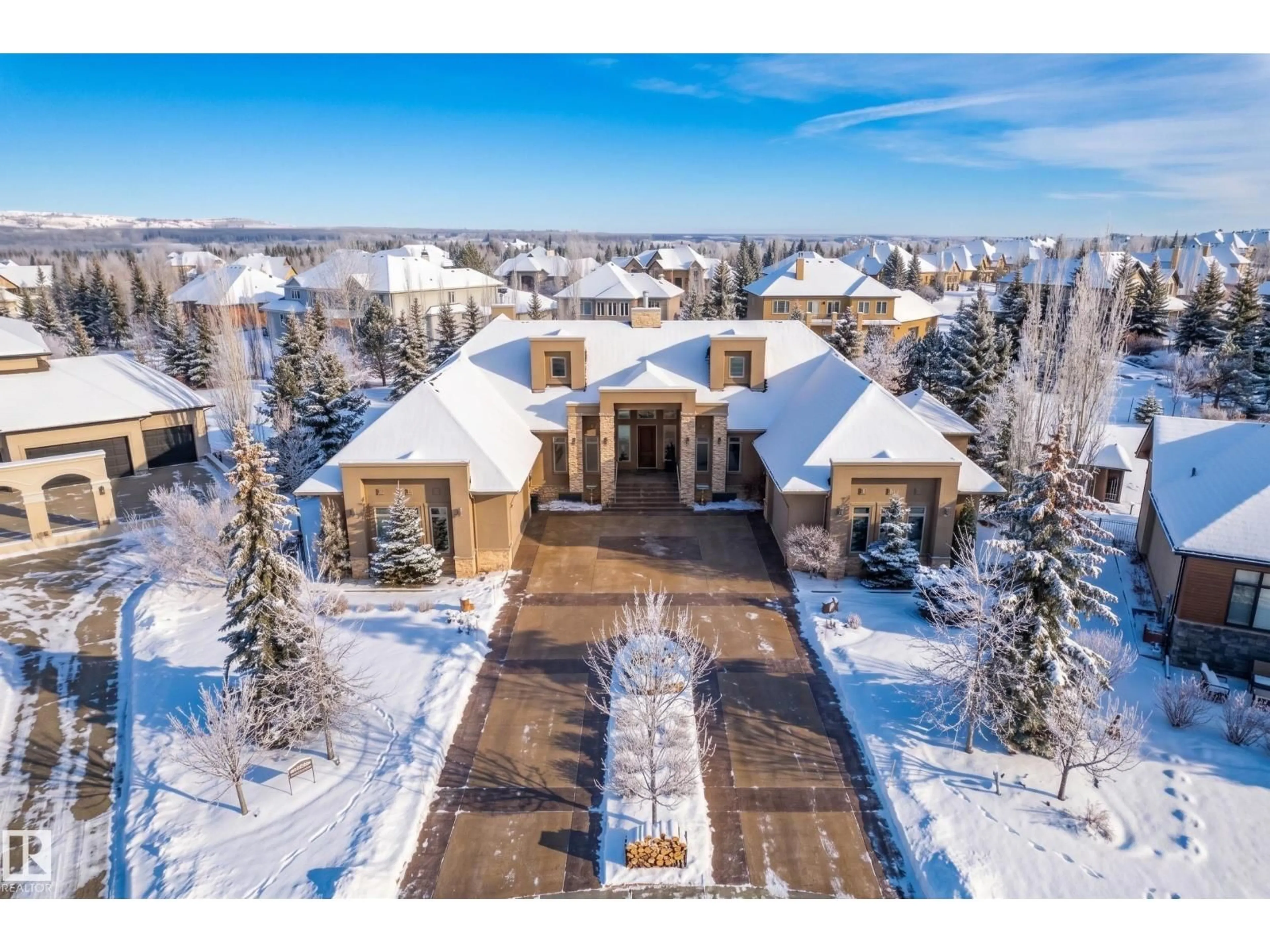 A pic from outside/outdoor area/front of a property/back of a property/a pic from drone, mountain view for 138 25015 TWP ROAD 544A, Rural Sturgeon County Alberta T8T0B9