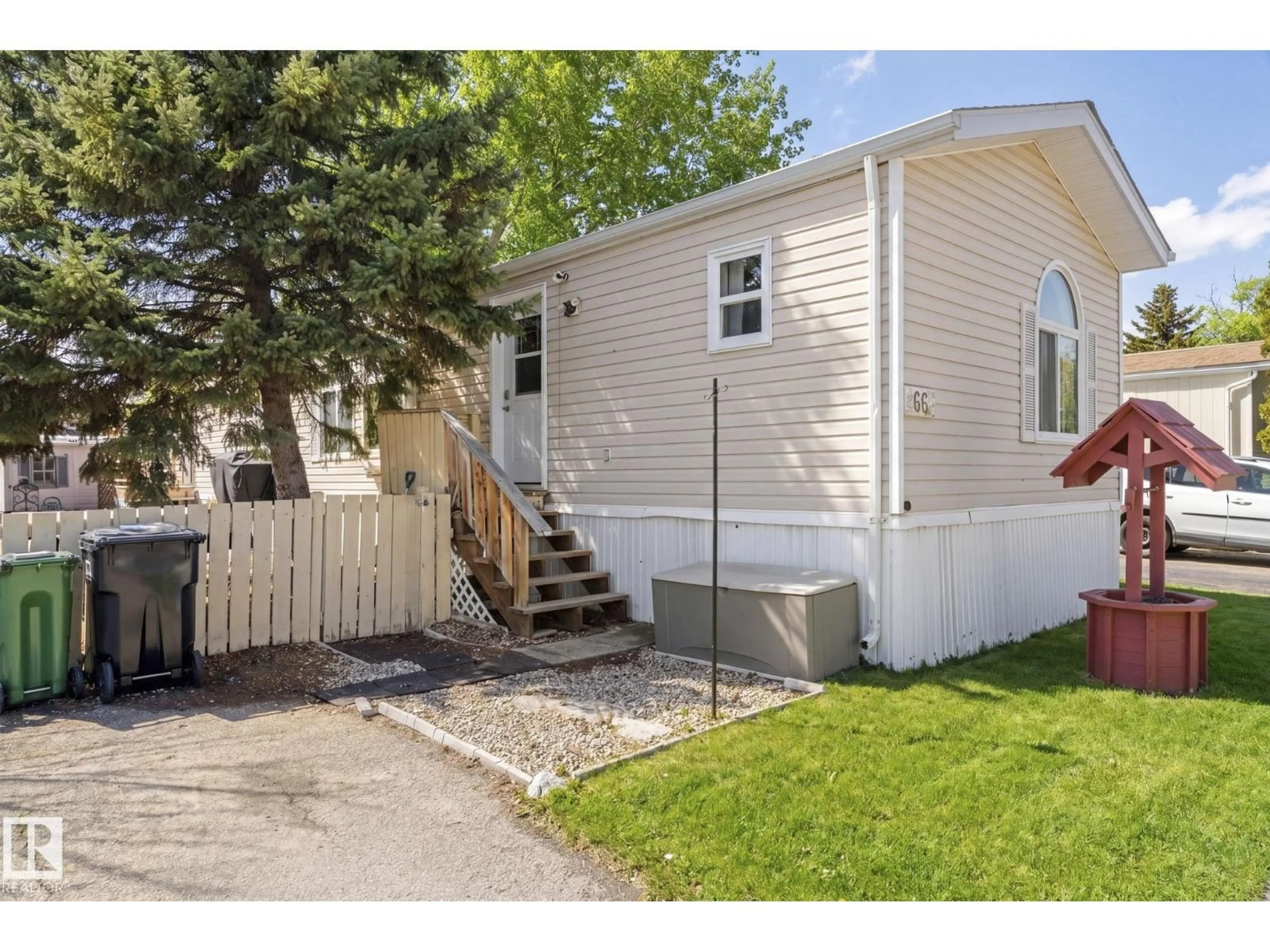 Home with vinyl exterior material, street for 66 EVERGREEN PARK NE, Edmonton Alberta T5Y4M2