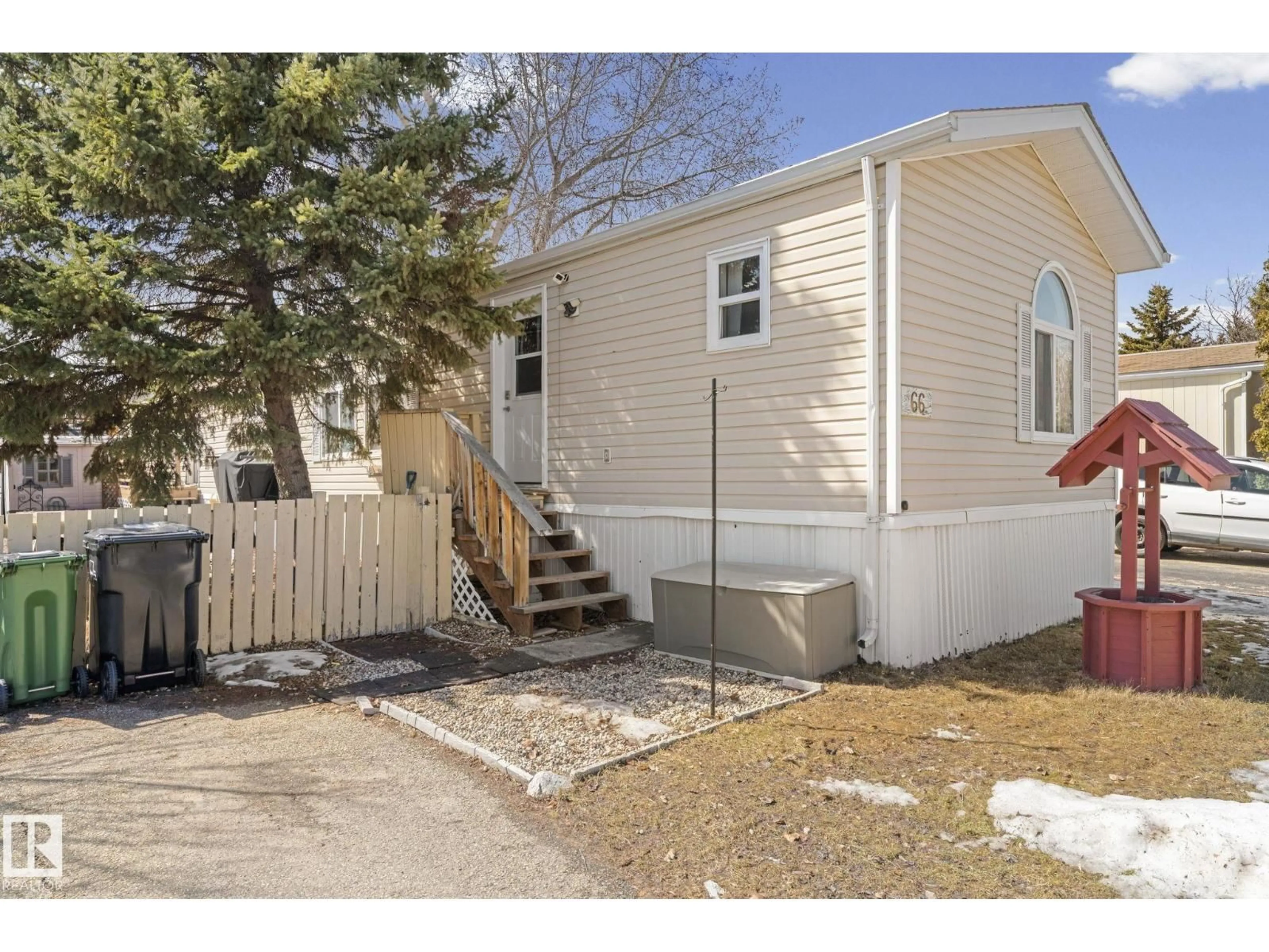 Home with vinyl exterior material, street for 66 EVERGREEN PARK NE, Edmonton Alberta T5Y4M2