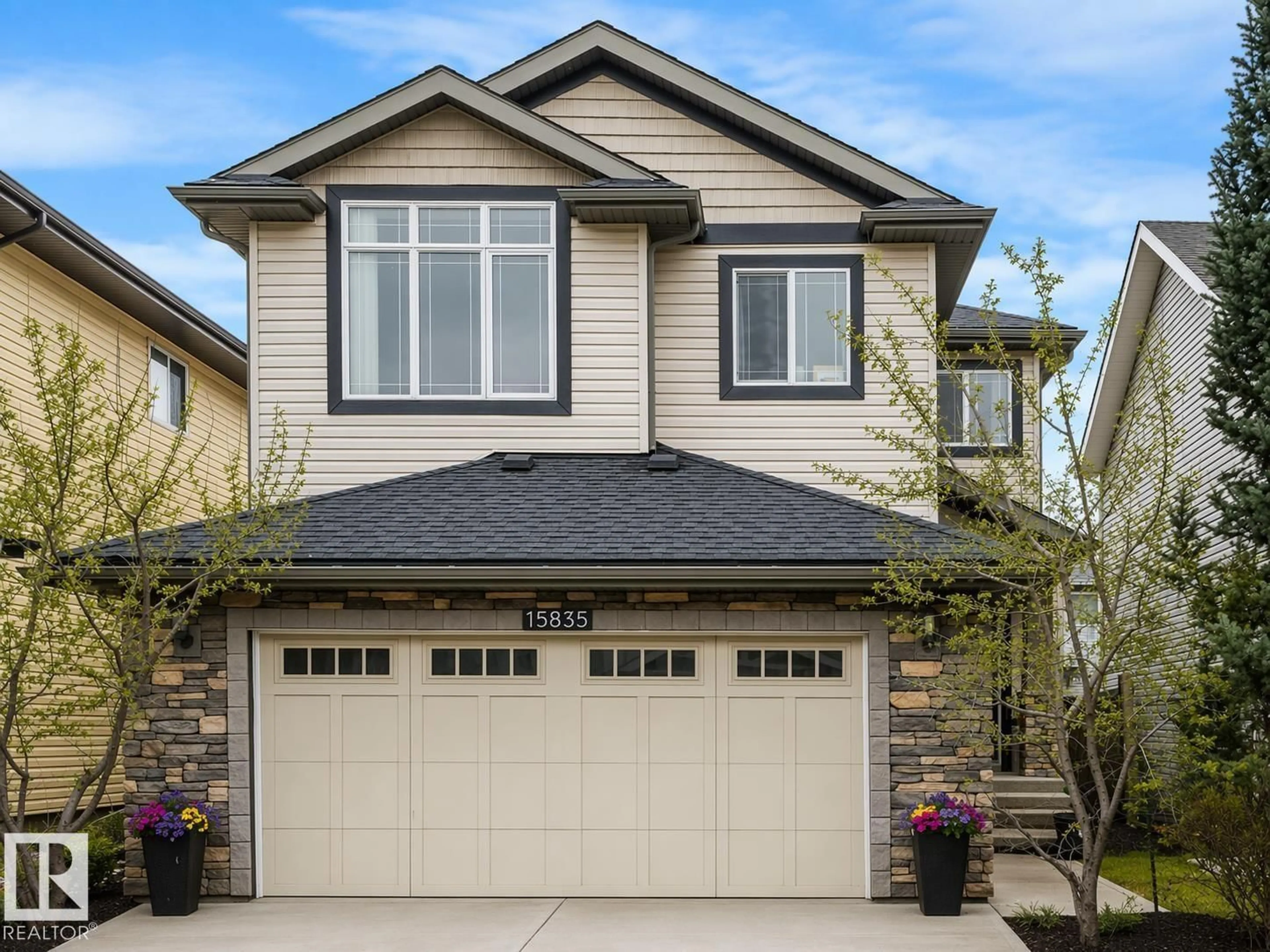 Home with vinyl exterior material, street for SW - 15835 10 AV, Edmonton Alberta T6W2H2