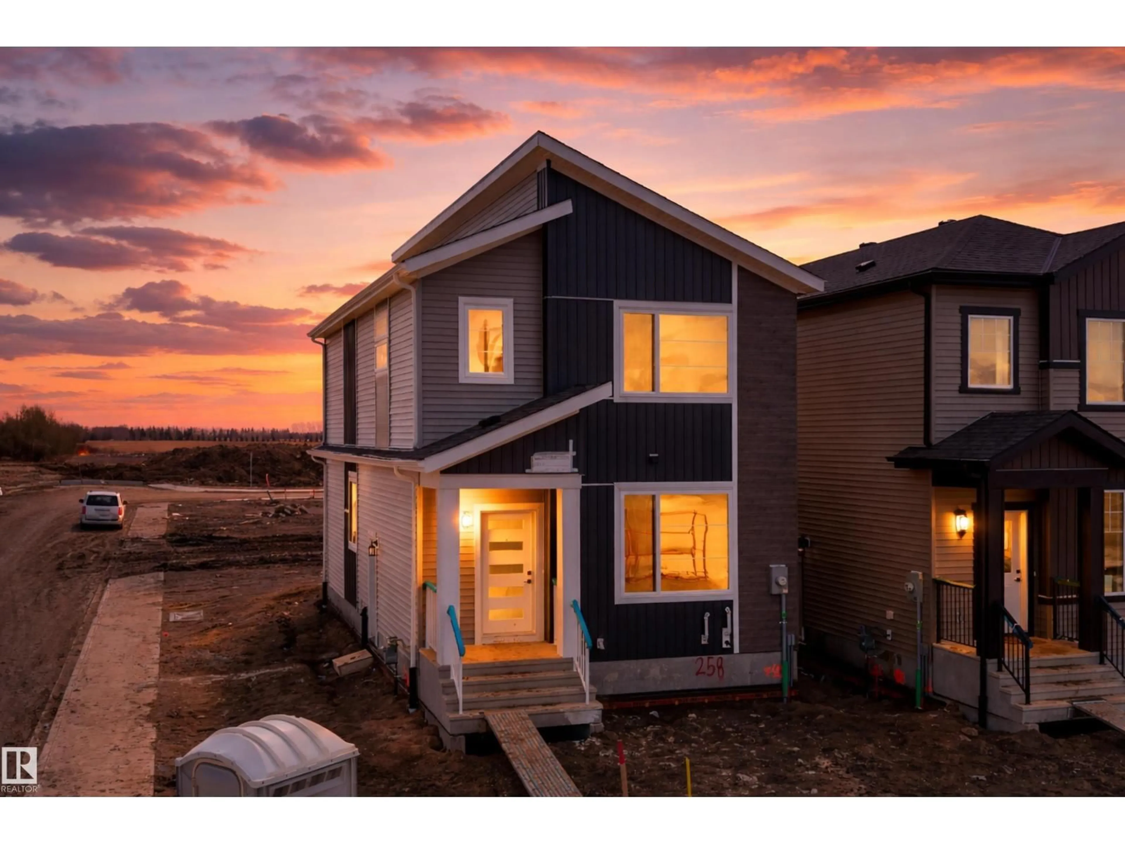 Home with vinyl exterior material, street for 258 BLACK STONE DR, Leduc Alberta T9E1G2