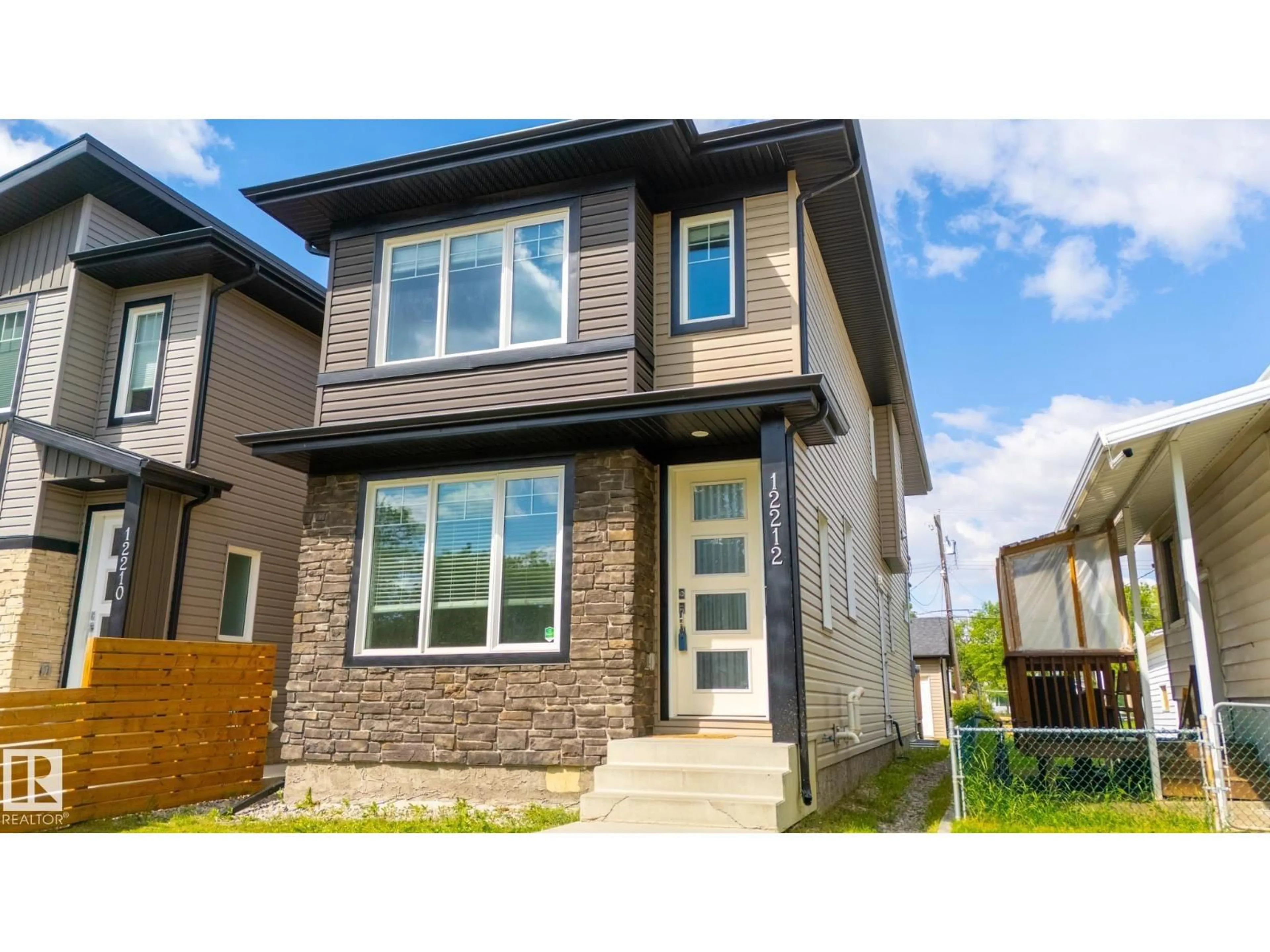 Home with vinyl exterior material, street for NW - 12212 124 ST, Edmonton Alberta T5R3G8