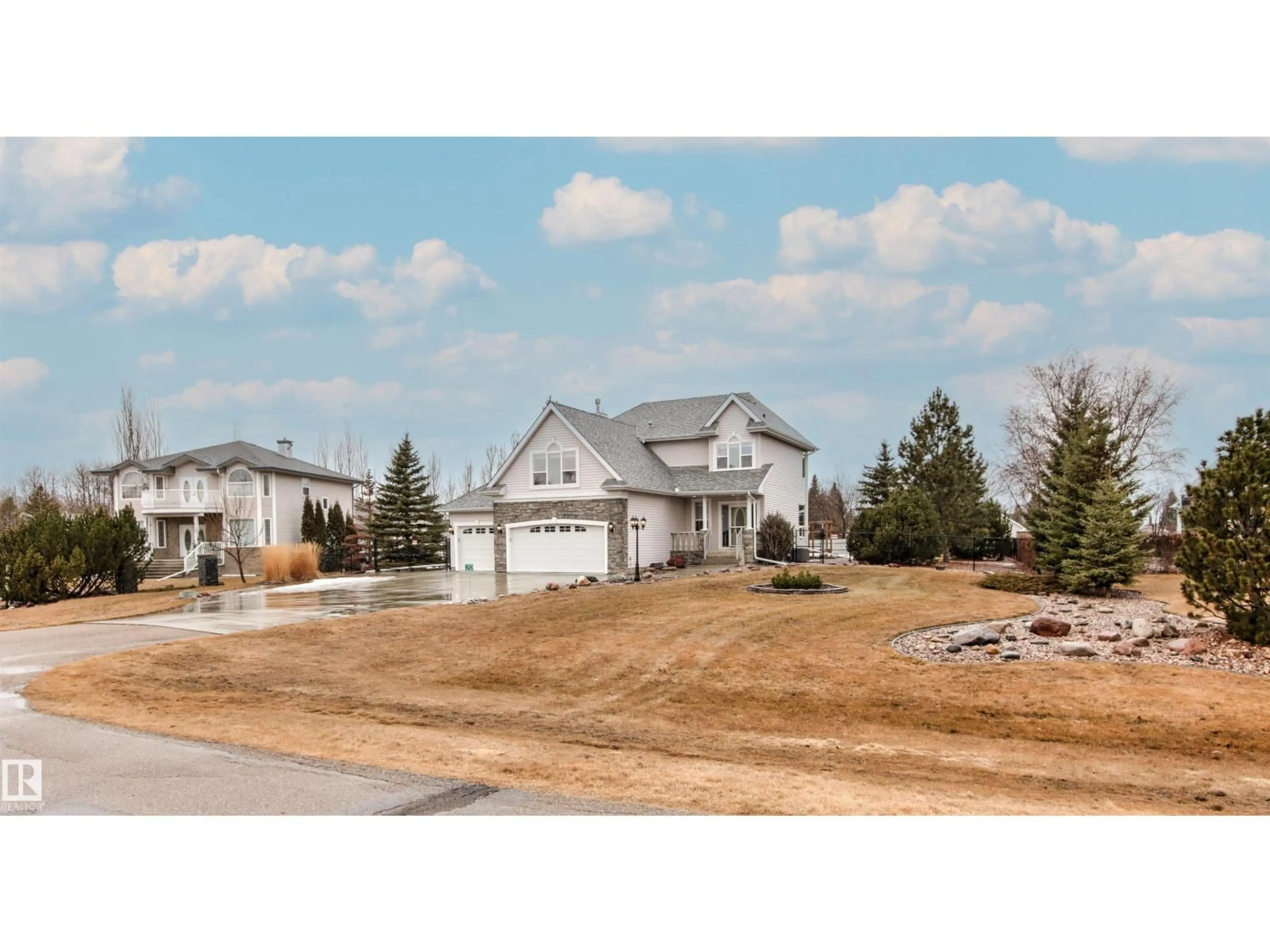 Home with vinyl exterior material, street for 53302 - 20 RGE ROAD 261, Rural Parkland County Alberta T7Y1A7