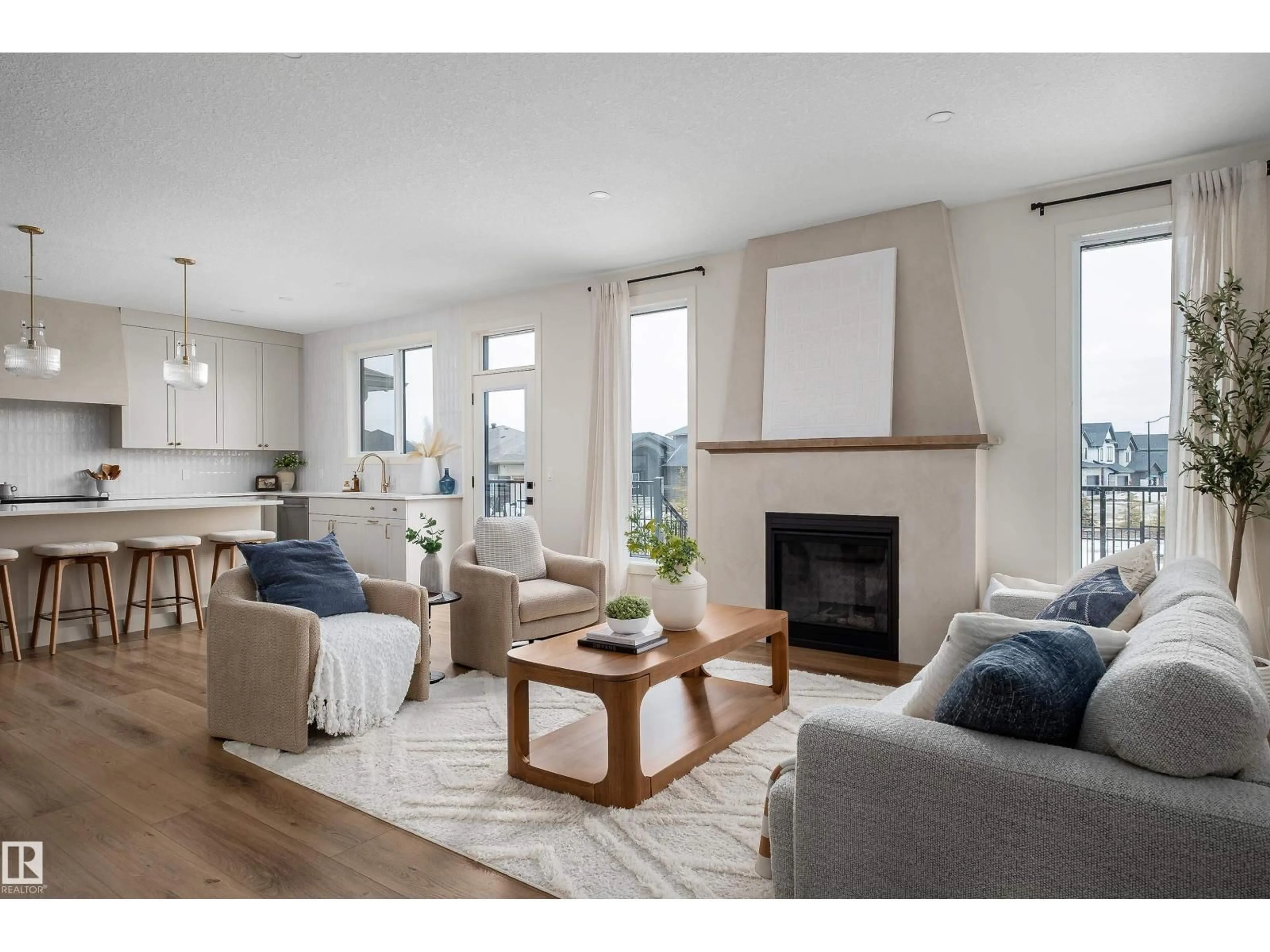 Living room with furniture, wood/laminate floor for 24 SYDWYCK CI, Spruce Grove Alberta T7X4C9