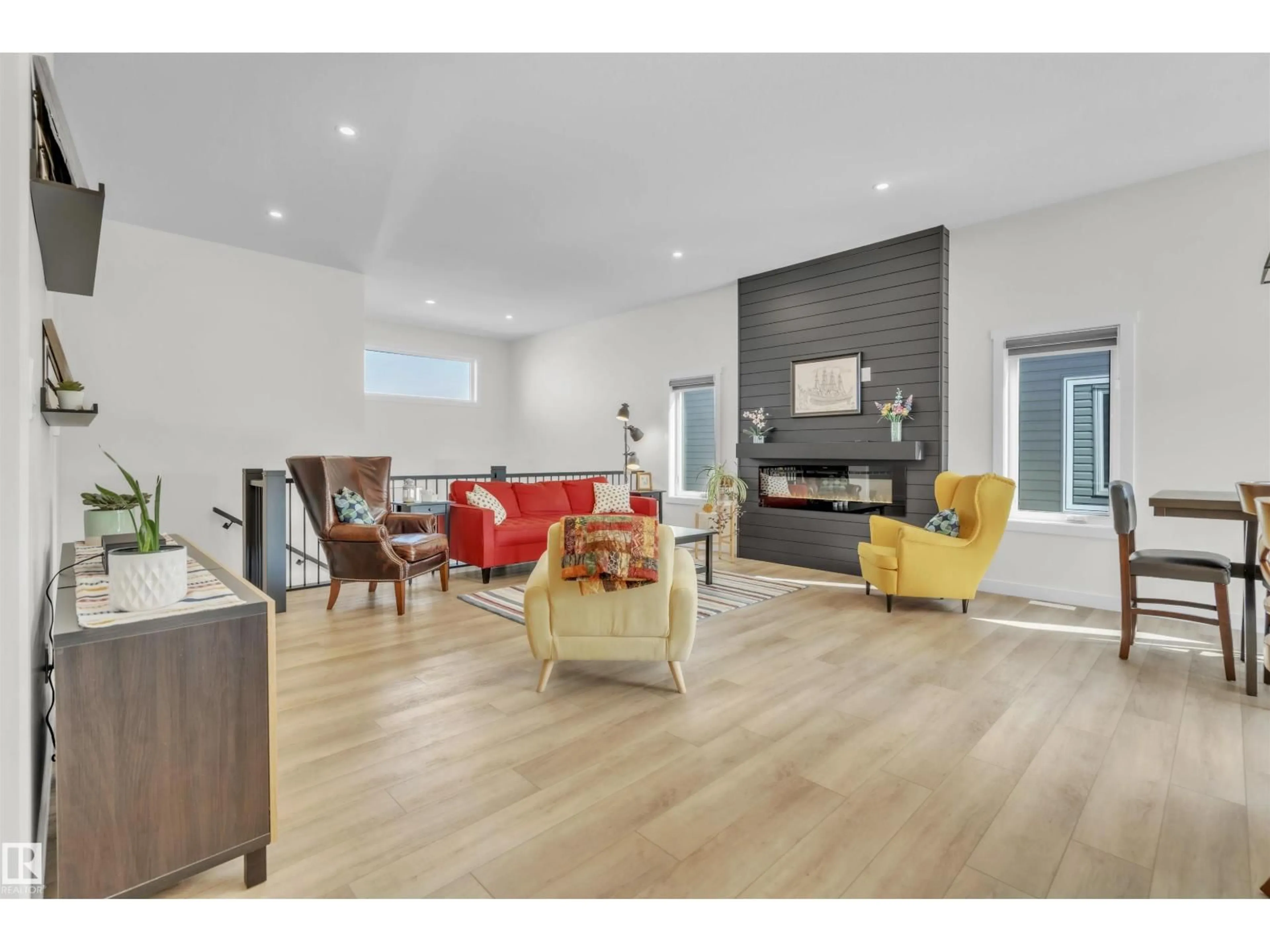 Living room with furniture, wood/laminate floor for 304 FUNDY WY, Cold Lake Alberta T9M0L4