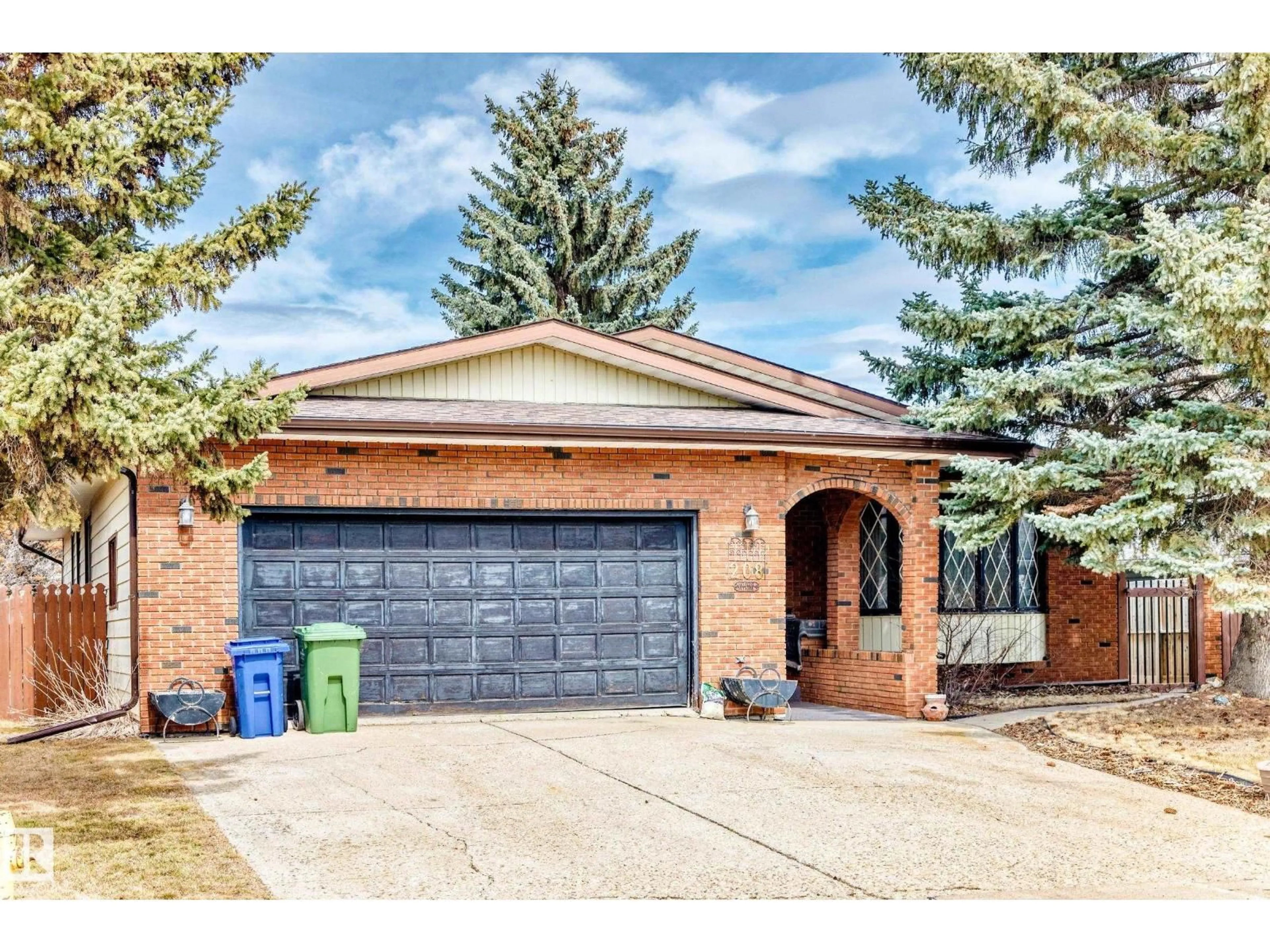 Home with brick exterior material, street for 208 WILLOW CR, Wetaskiwin Alberta T9A2X2