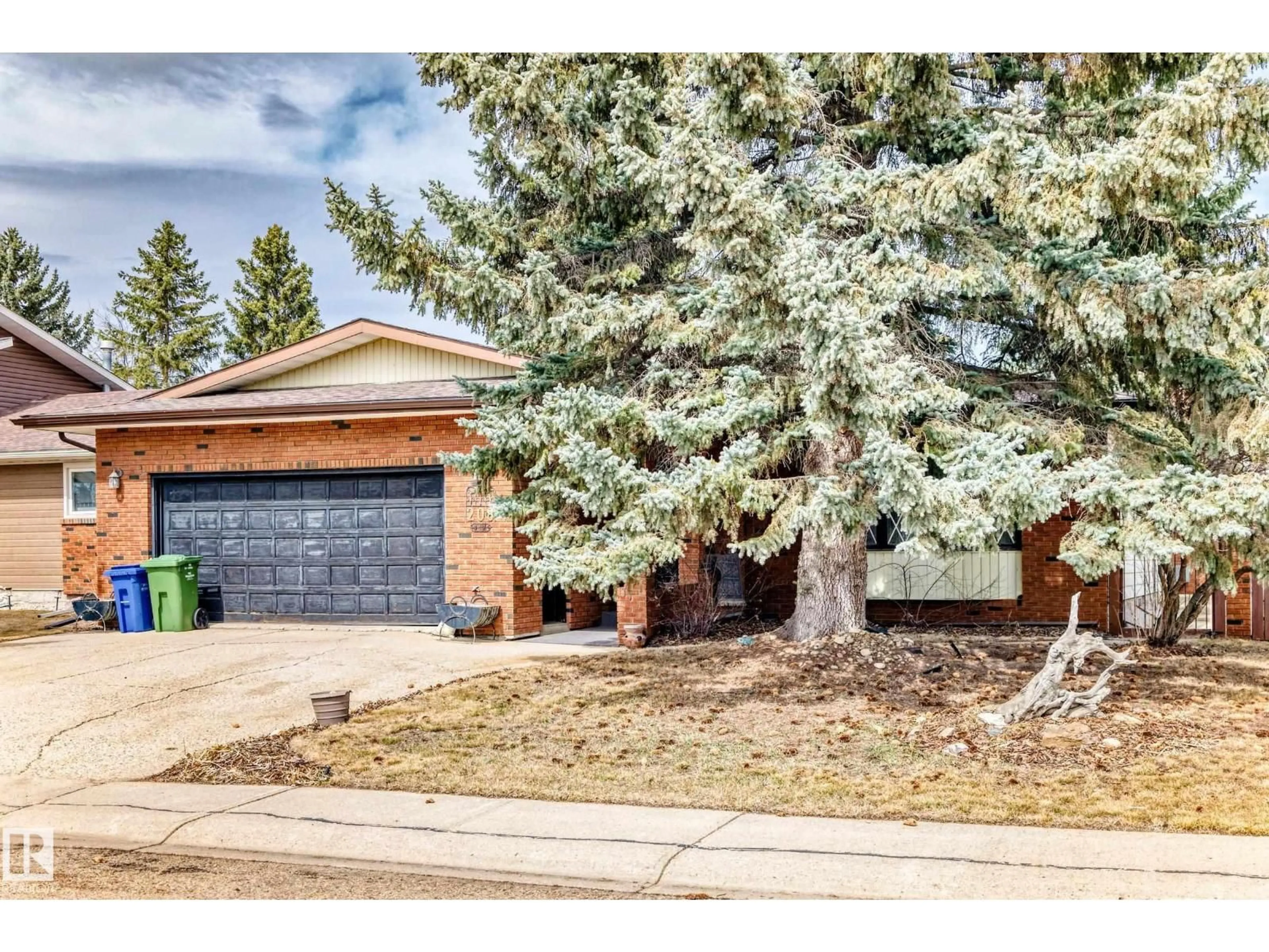 Home with brick exterior material, street for 208 WILLOW CR, Wetaskiwin Alberta T9A2X2