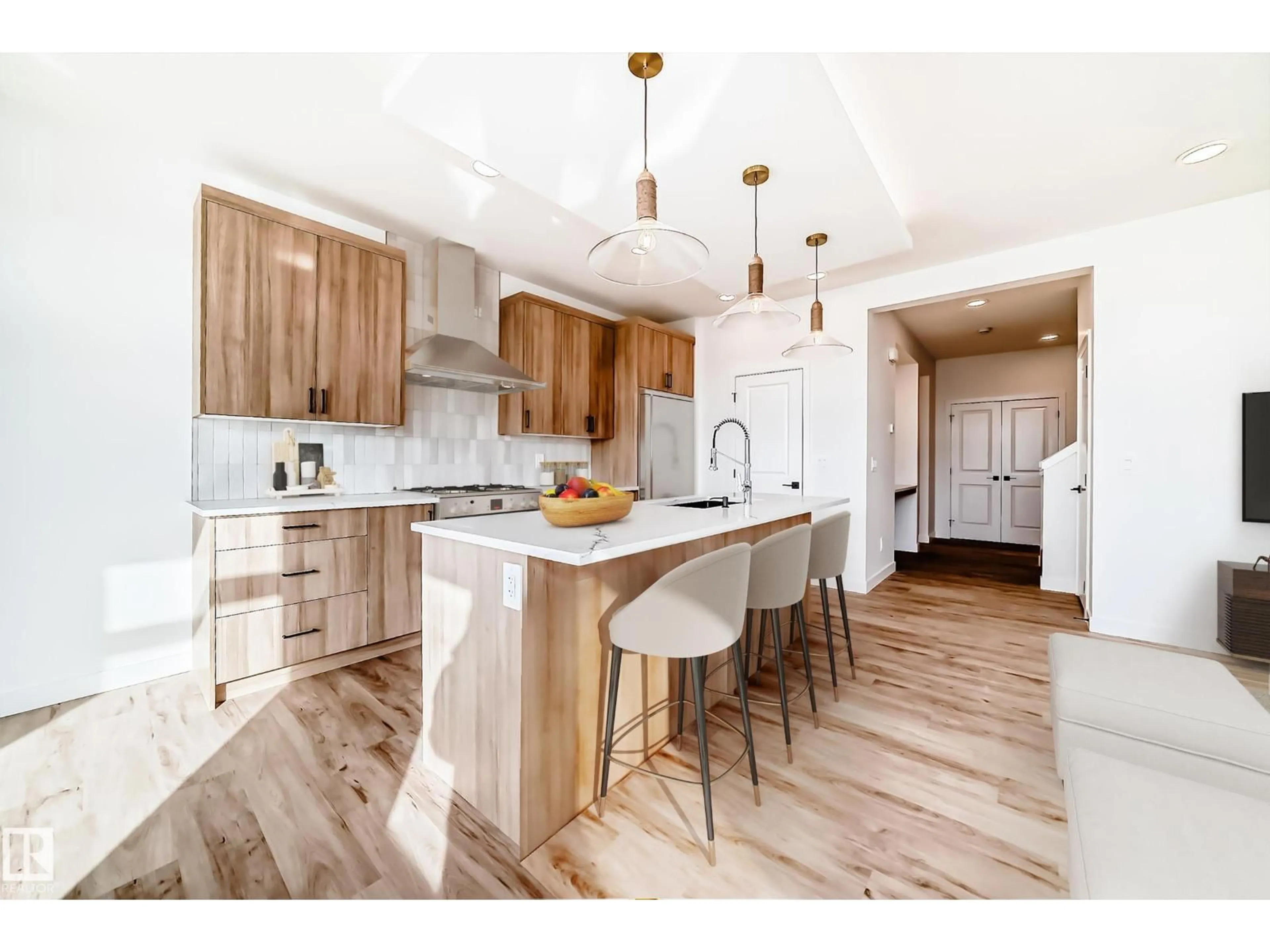 Open concept kitchen, wood/laminate floor for 8235 KIRIAK LO SW, Edmonton Alberta T6W5S2