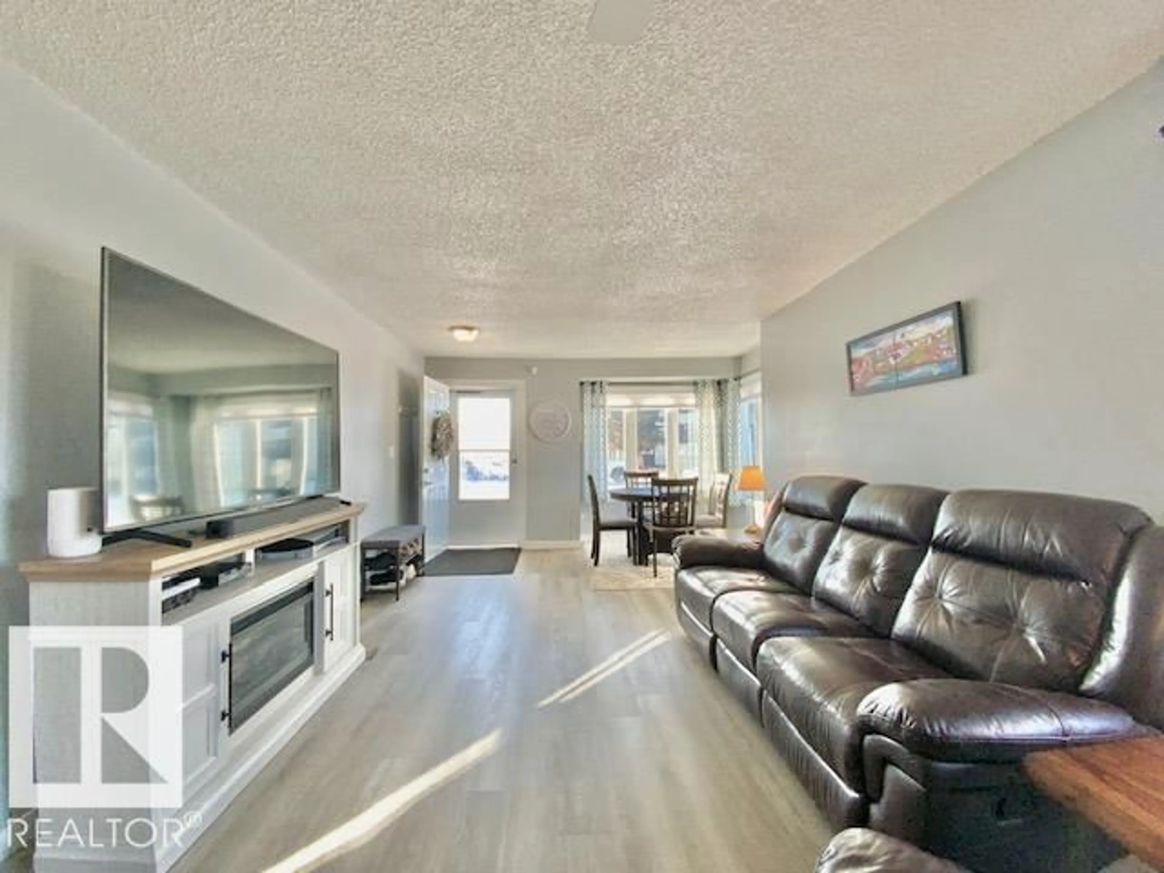 Living room with furniture, unknown for 5118 56 AV, Wetaskiwin Alberta T9A3N5