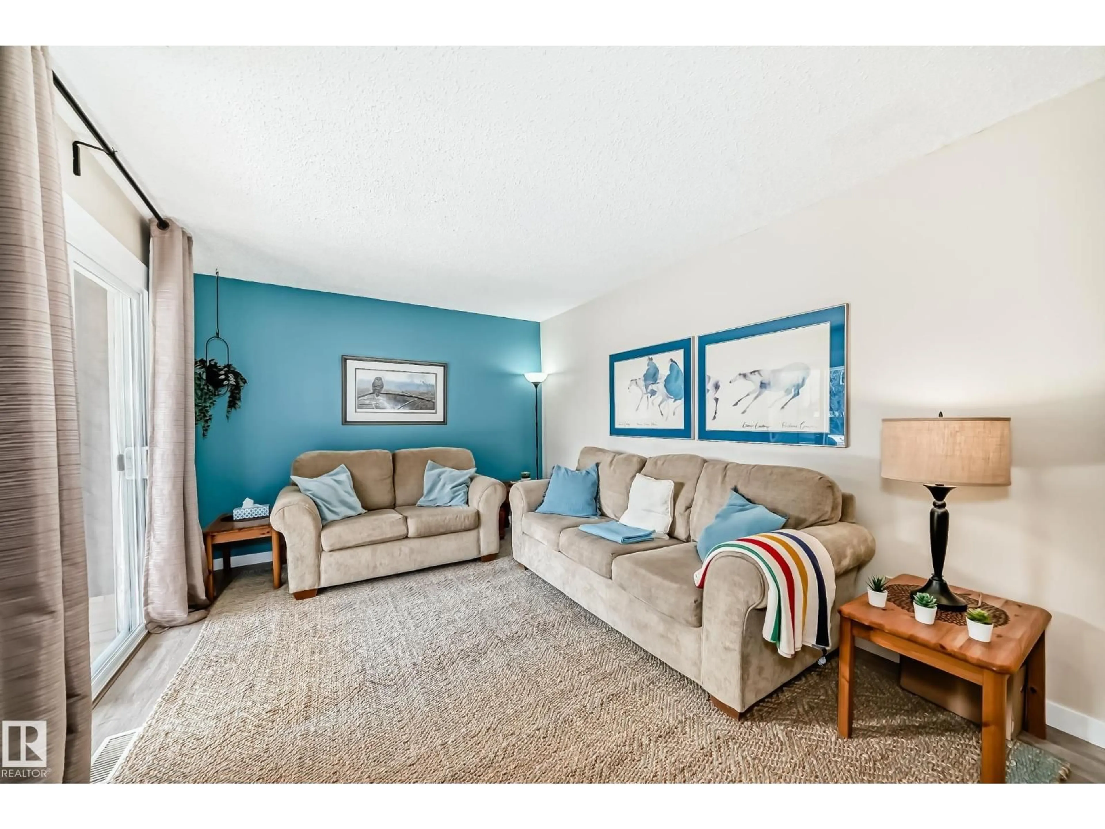 Living room with furniture, unknown for 8113 27 AV, Edmonton Alberta T6K3C9