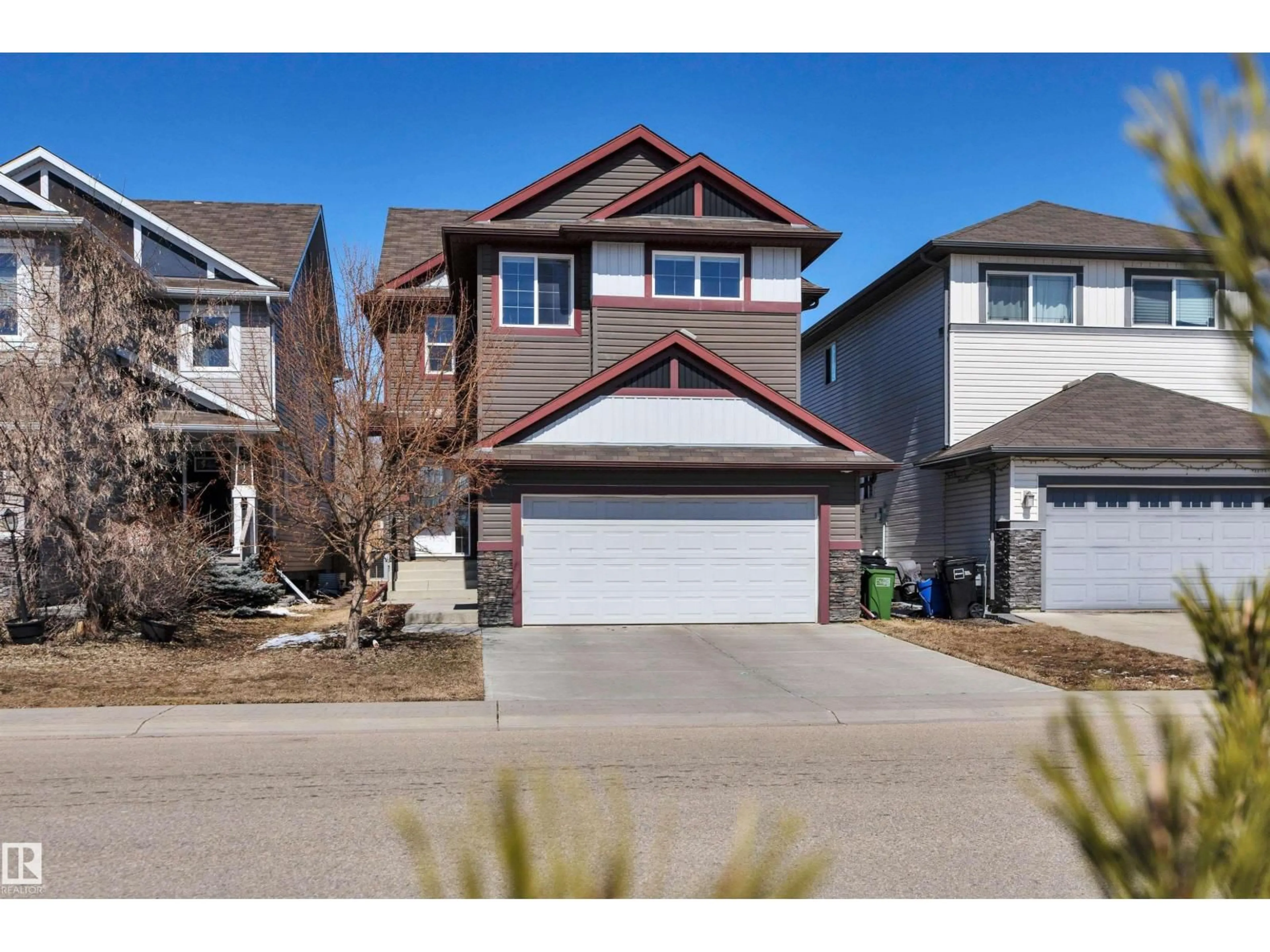 Home with vinyl exterior material, street for NW - 12128 172 AV, Edmonton Alberta T5X0H3