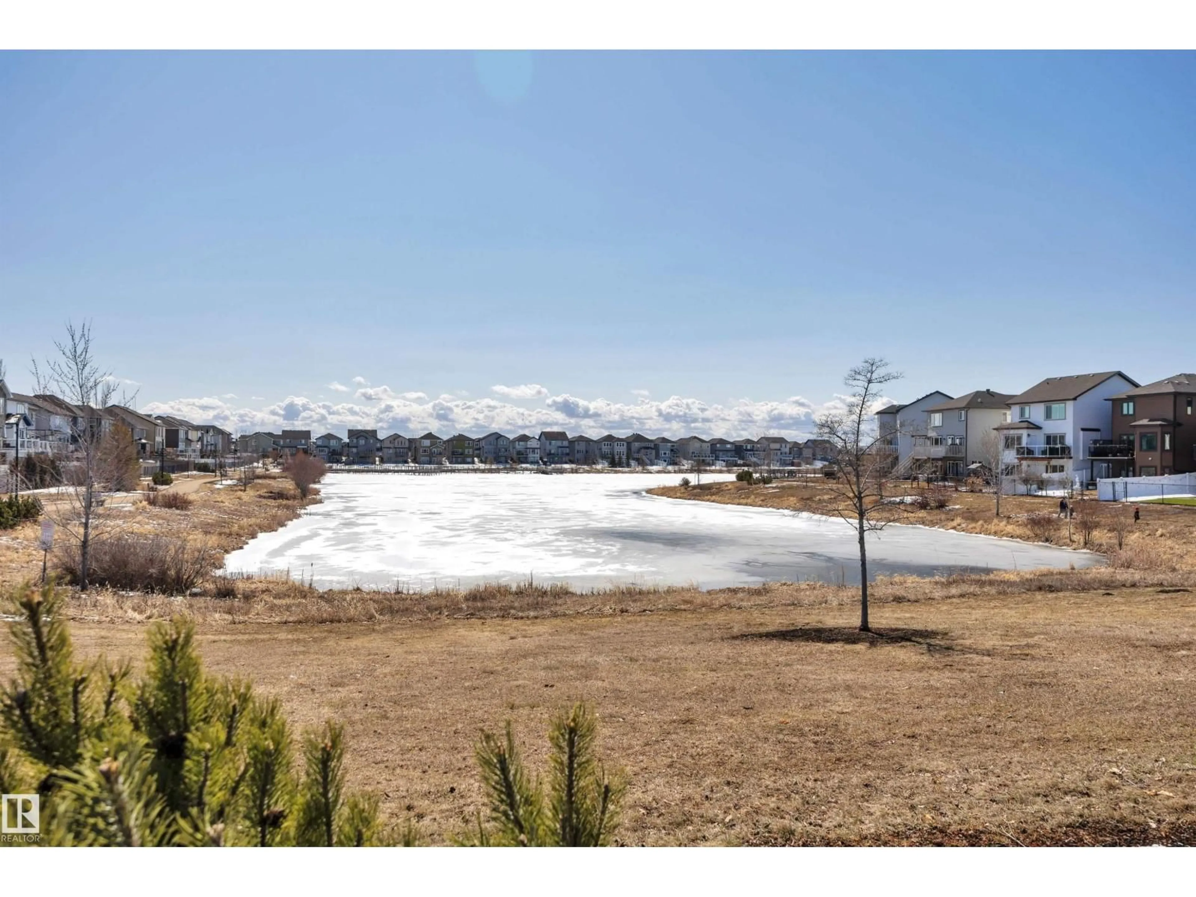 A pic from outside/outdoor area/front of a property/back of a property/a pic from drone, water/lake/river/ocean view for NW - 12128 172 AV, Edmonton Alberta T5X0H3