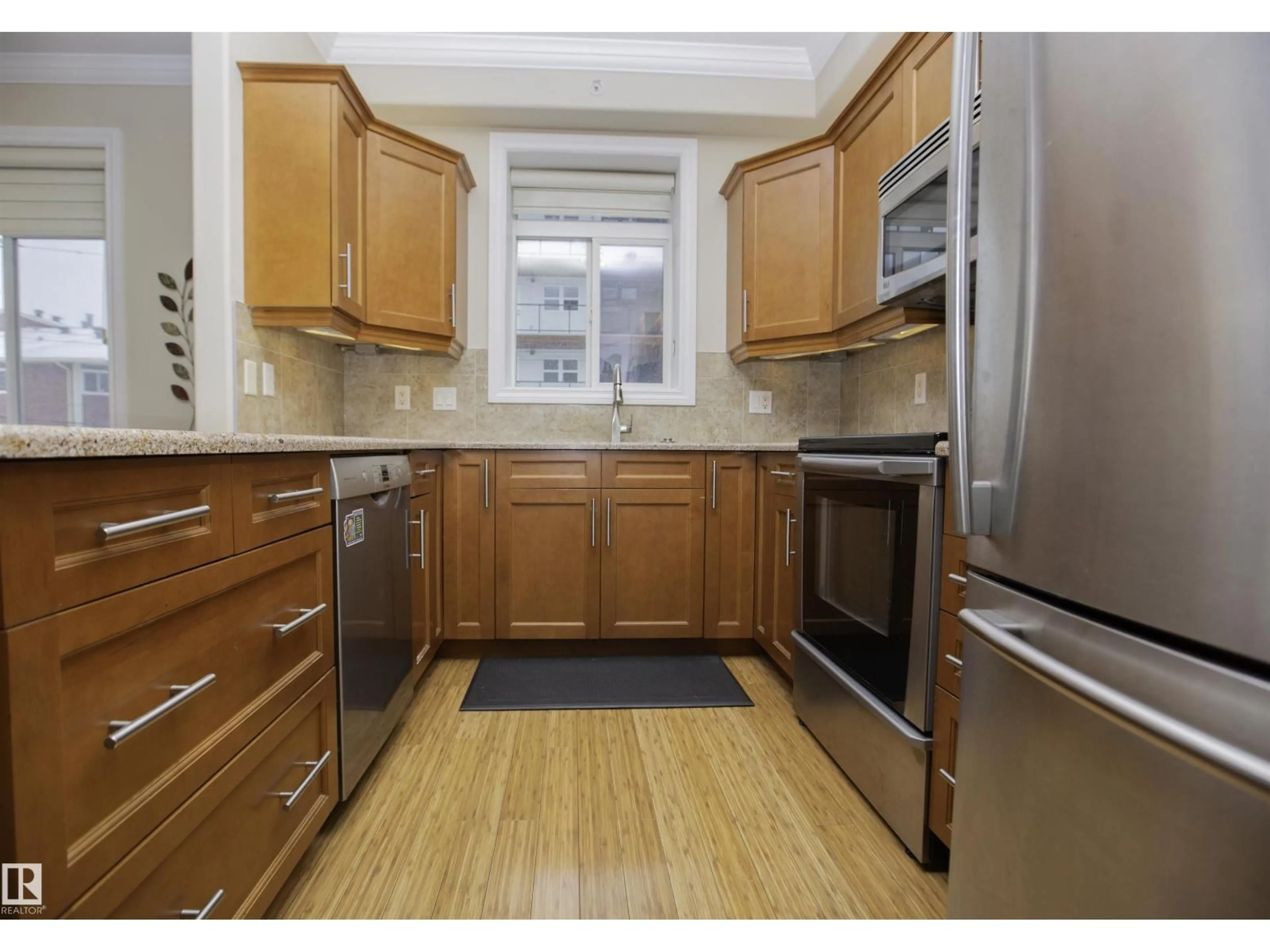 Standard kitchen, wood/laminate floor for 202 - 8631 108 ST, Edmonton Alberta T6E4M5