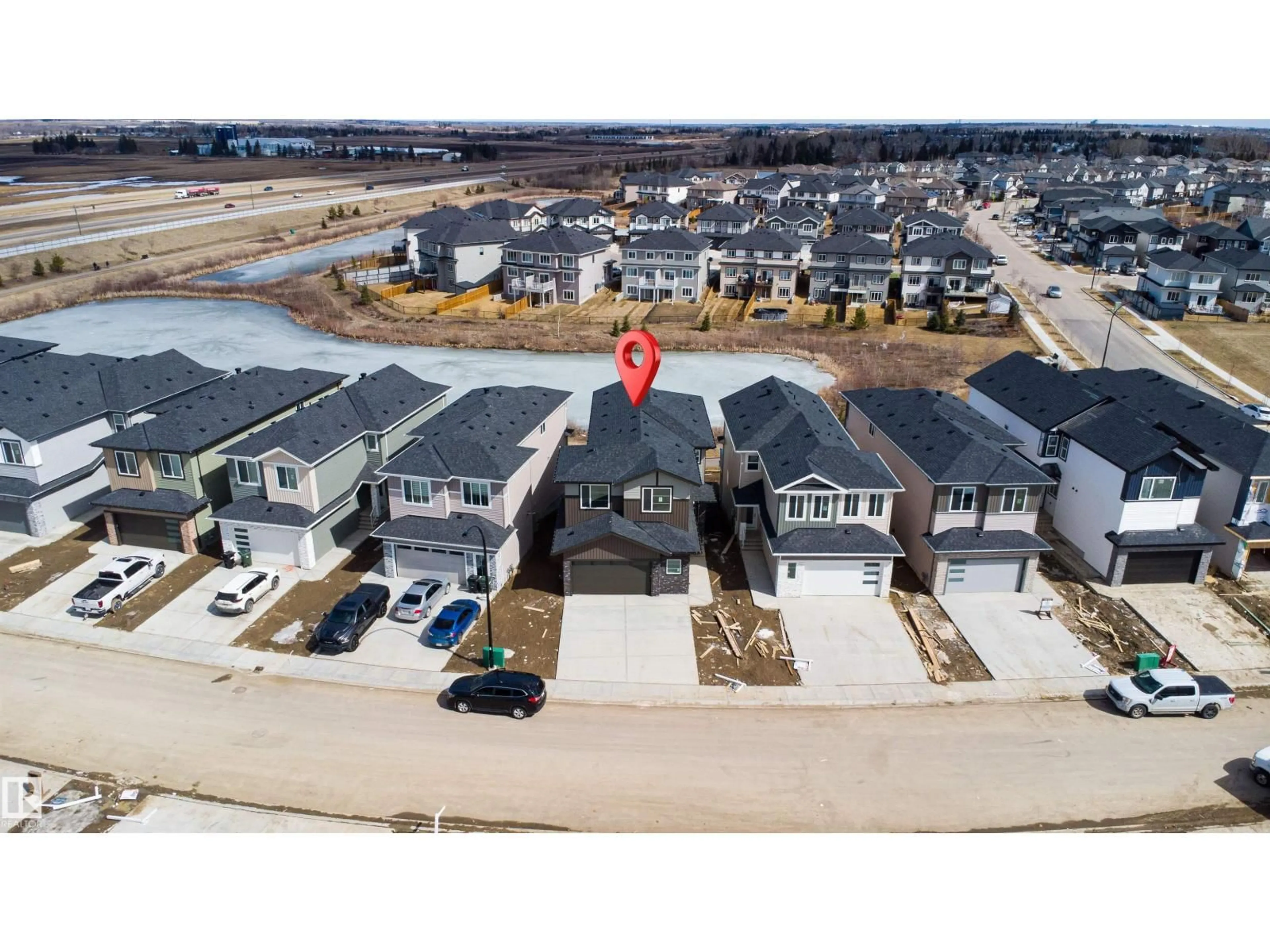 A pic from outside/outdoor area/front of a property/back of a property/a pic from drone, street for 9 AXELWOOD CR, Spruce Grove Alberta T7X4G4