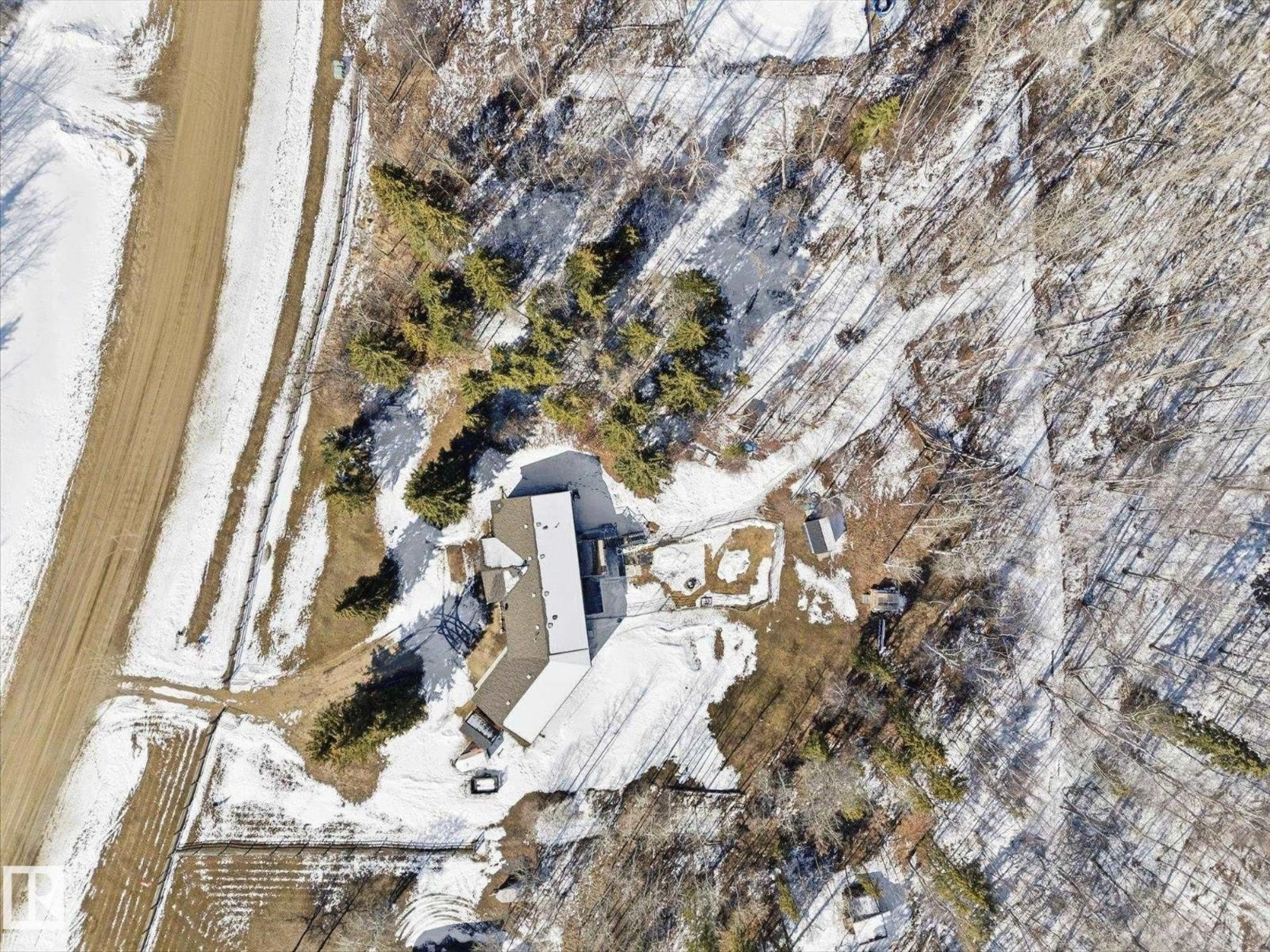 A pic from outside/outdoor area/front of a property/back of a property/a pic from drone, street for 202 - 55108 RANGE ROAD 15, Rural Lac Ste. Anne County Alberta T0E1V0