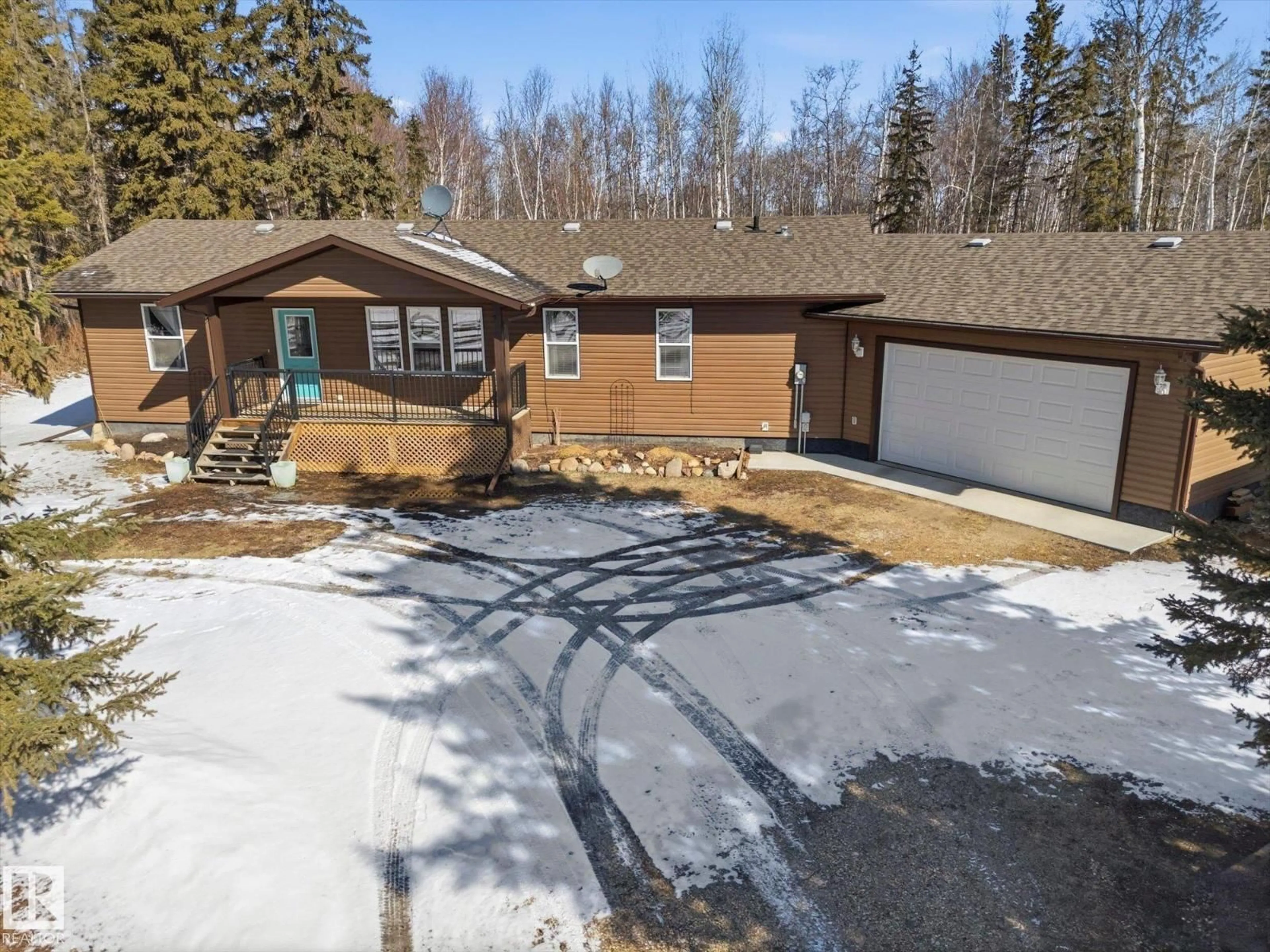 A pic from outside/outdoor area/front of a property/back of a property/a pic from drone, street for 202 - 55108 RANGE ROAD 15, Rural Lac Ste. Anne County Alberta T0E1V0