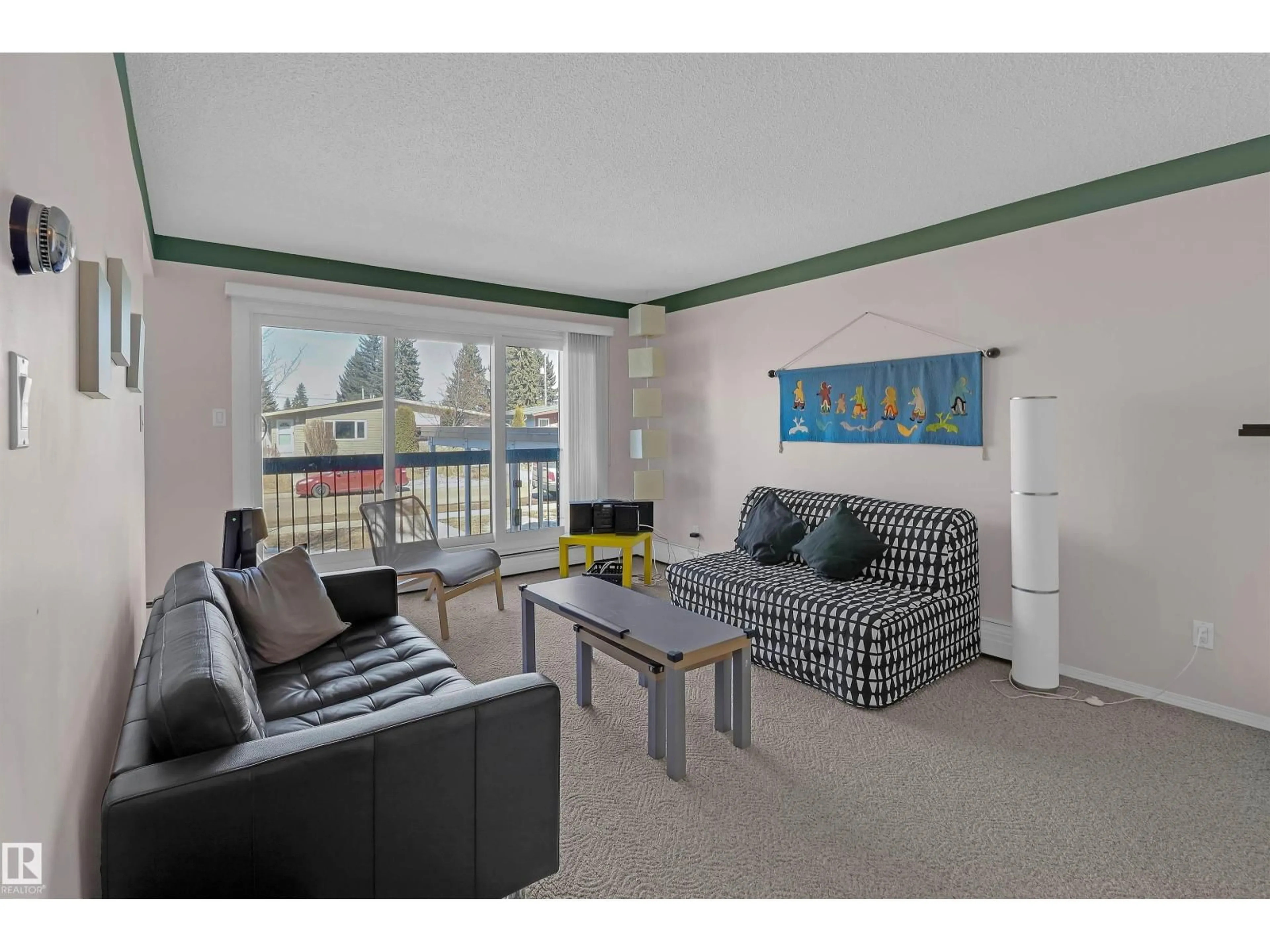 Living room with furniture, unknown for 201 - 11445 41 AV, Edmonton Alberta T6J0T9