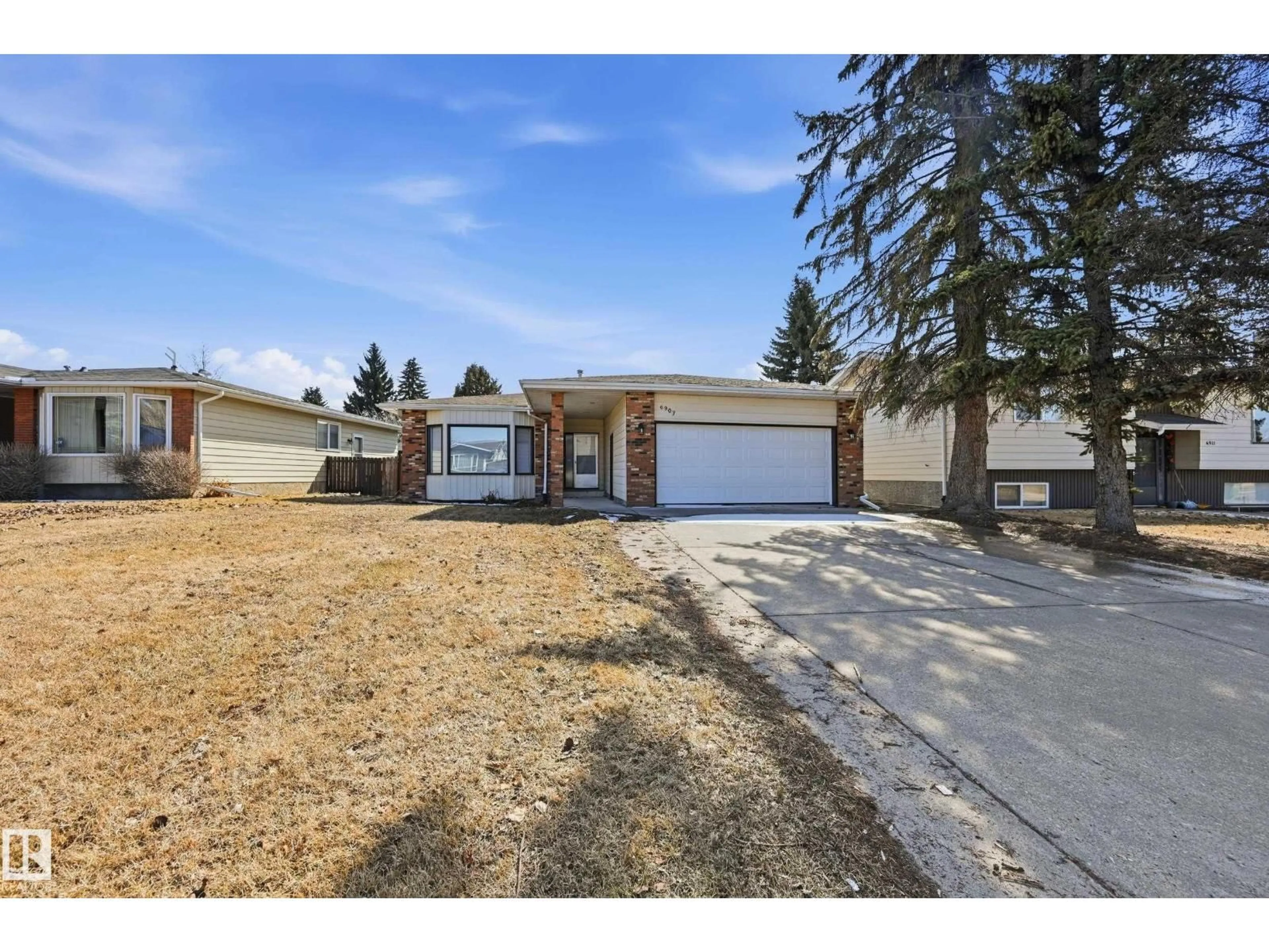 A pic from outside/outdoor area/front of a property/back of a property/a pic from drone, street for 6907 19 AV, Edmonton Alberta T6K2G7
