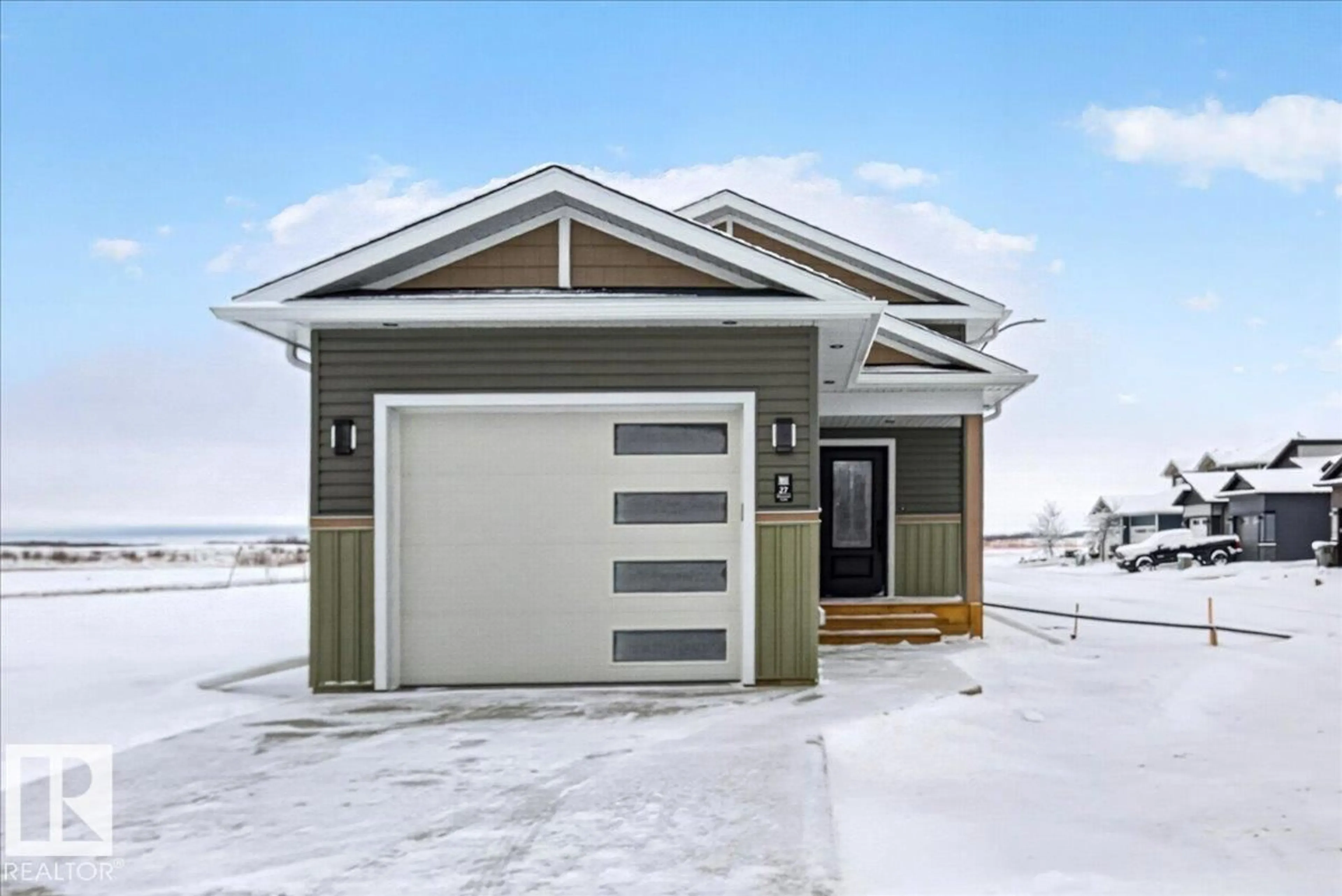 Home with vinyl exterior material, street for 27 WHITETAIL CV, Mundare Alberta T0B3H0