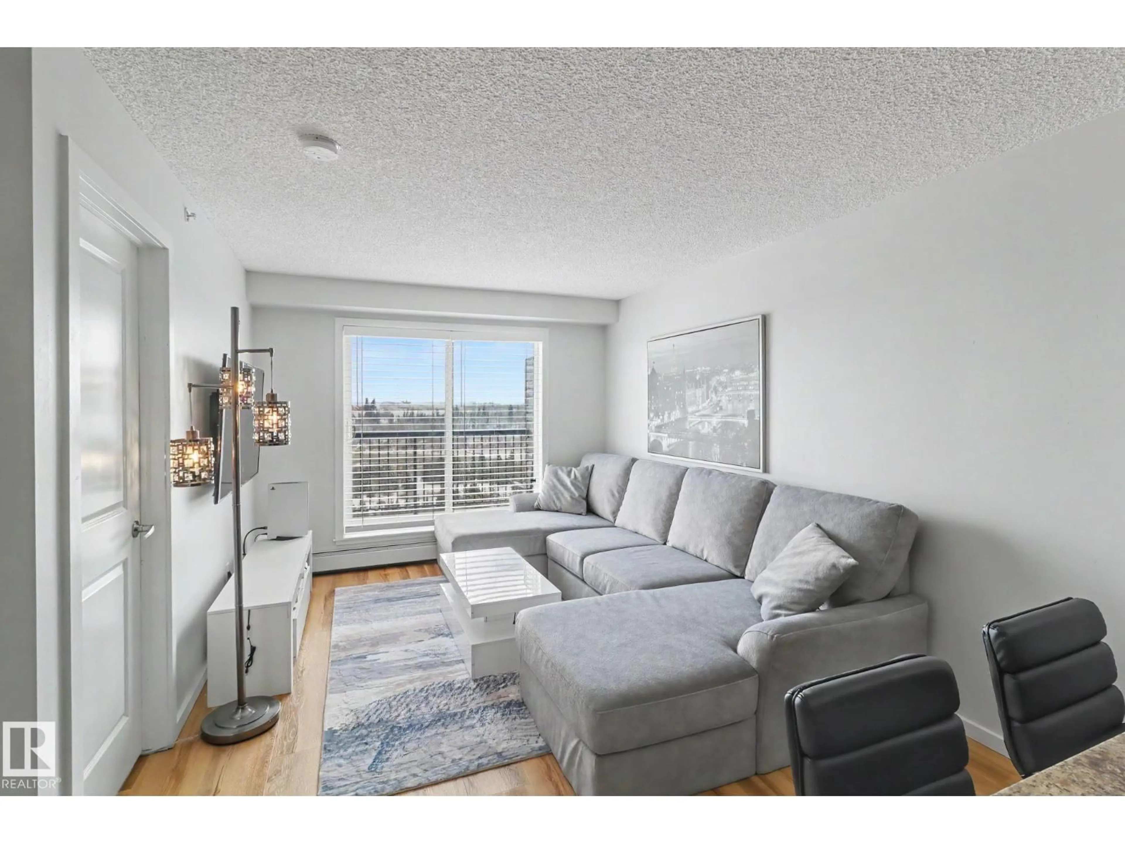 Living room with furniture, unknown for 451 1196 HYNDMAN RD, Edmonton Alberta T5A0X8