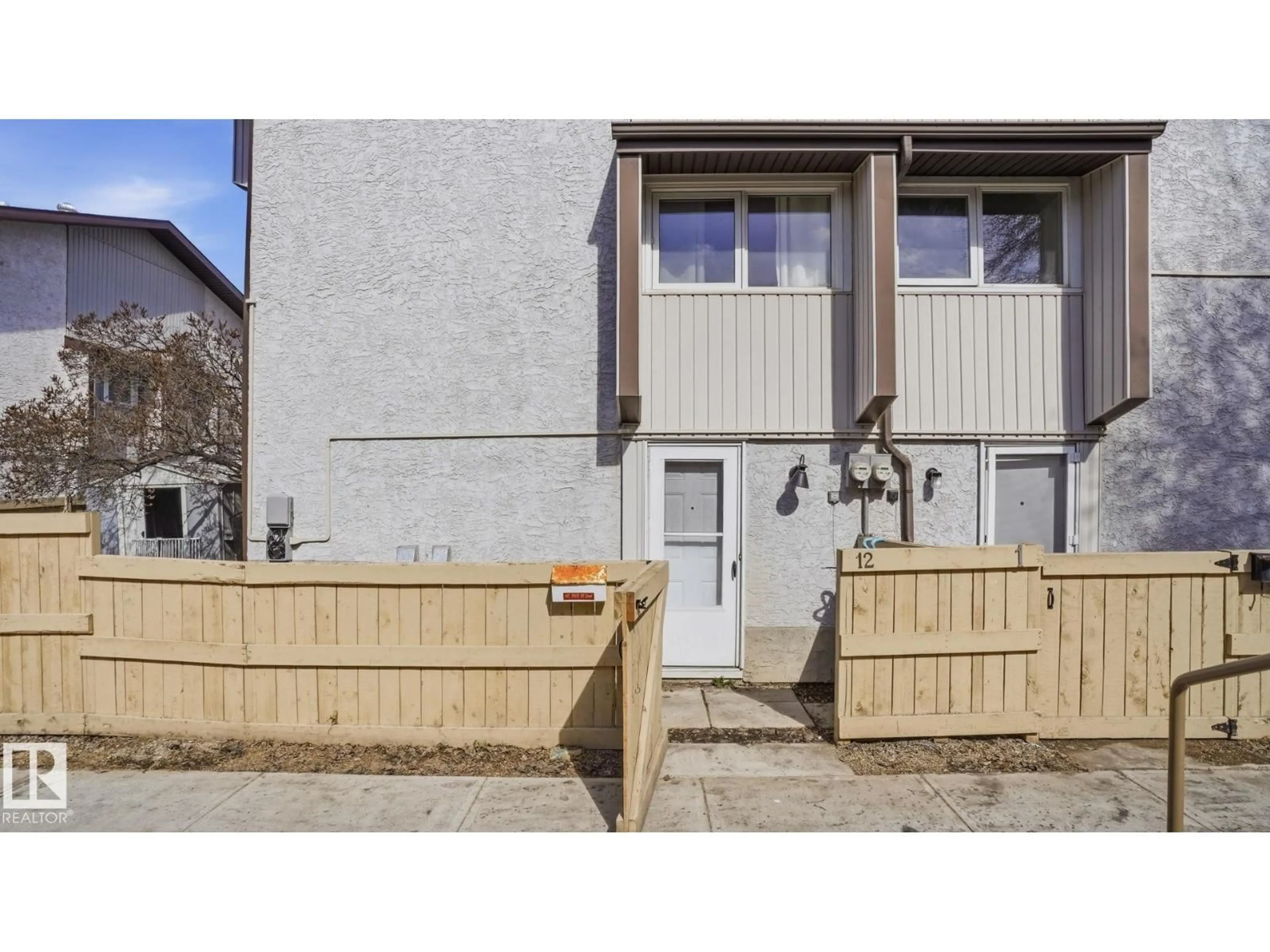 A pic from outside/outdoor area/front of a property/back of a property/a pic from drone, street for 12 14120 80 ST NW, Edmonton Alberta T5C1L6