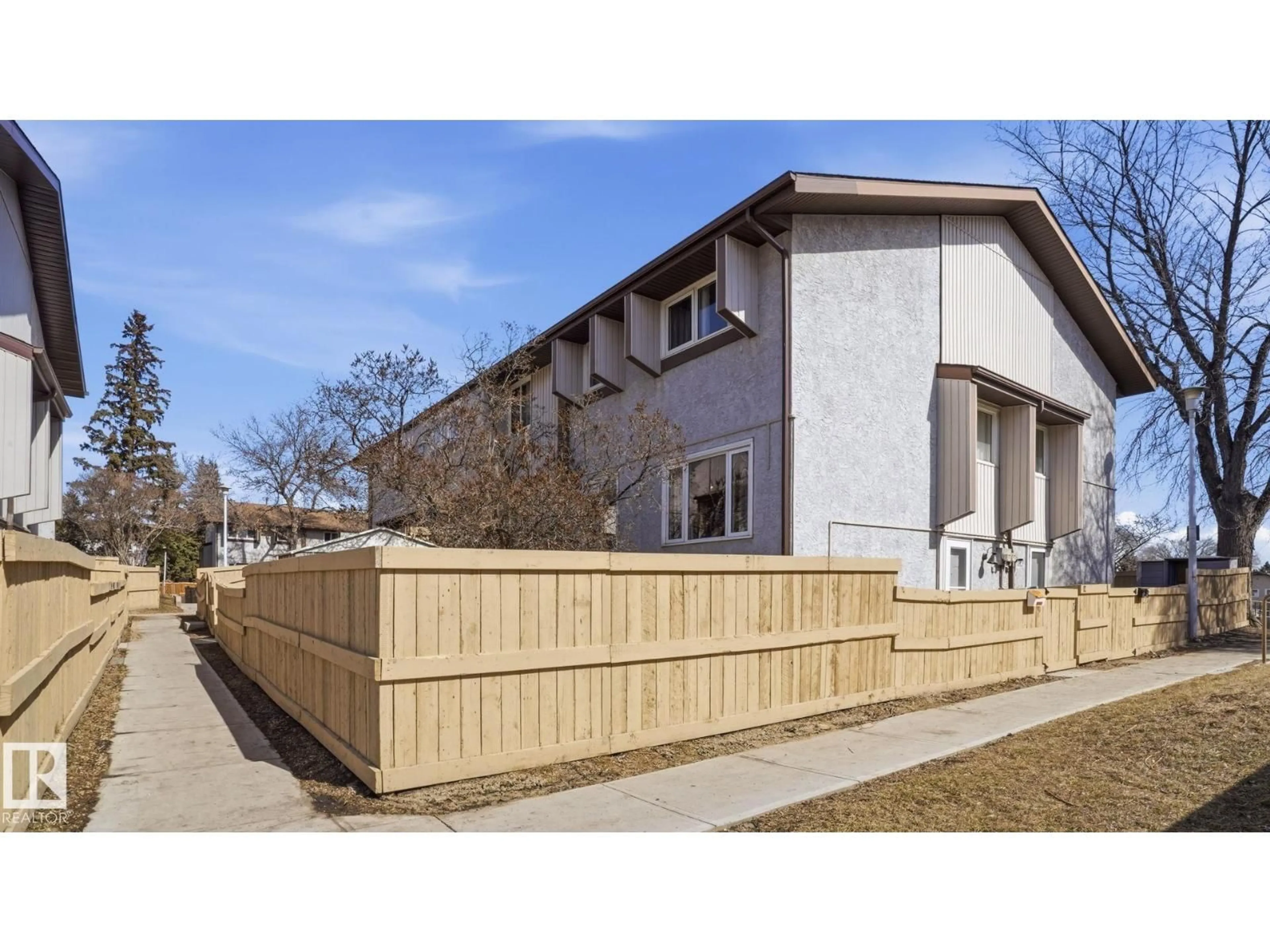 Home with vinyl exterior material, street for 12 14120 80 ST NW, Edmonton Alberta T5C1L6