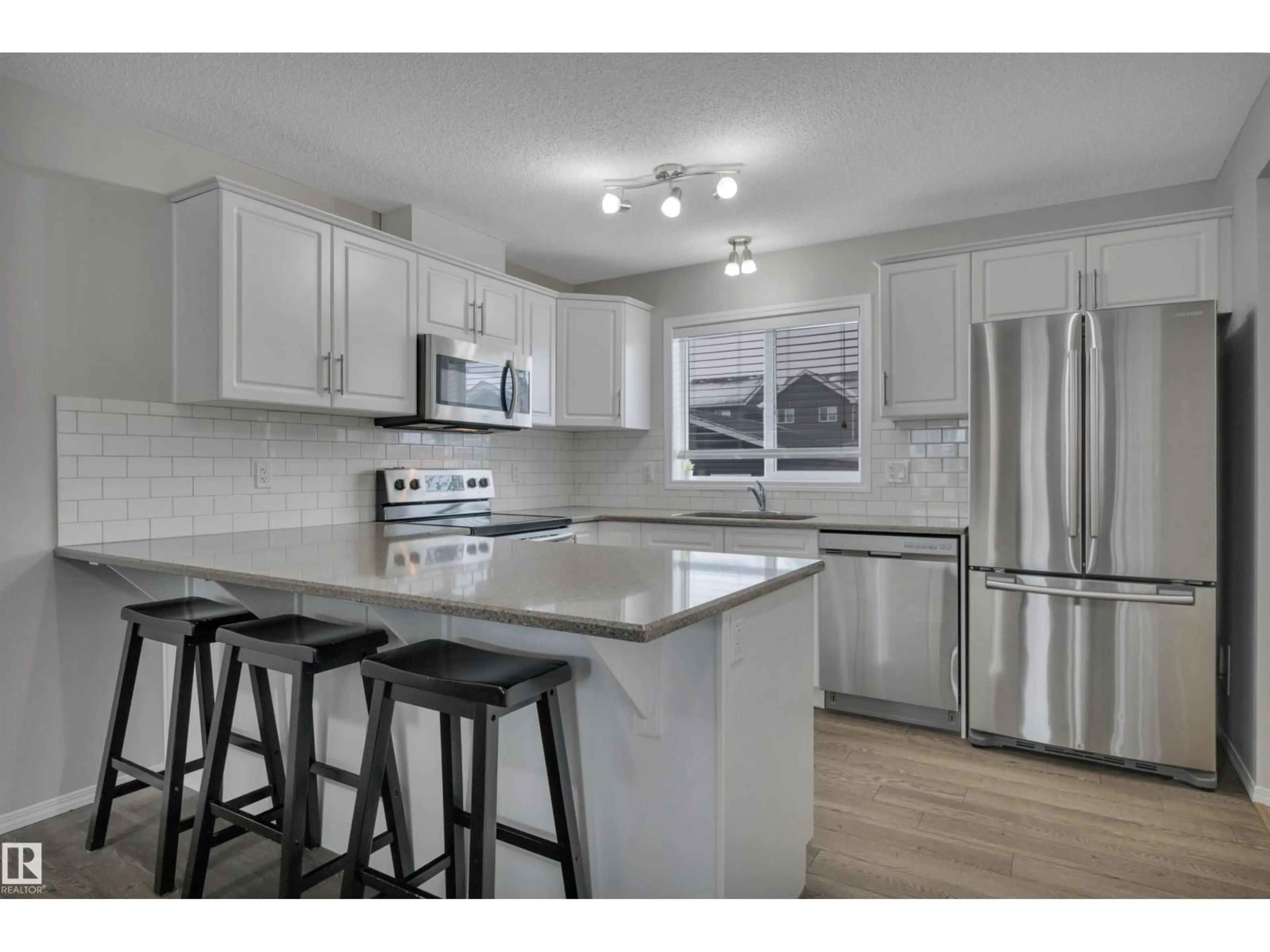 Open concept kitchen, unknown for 427 SIMPKINS LI, Leduc Alberta T9E1B3