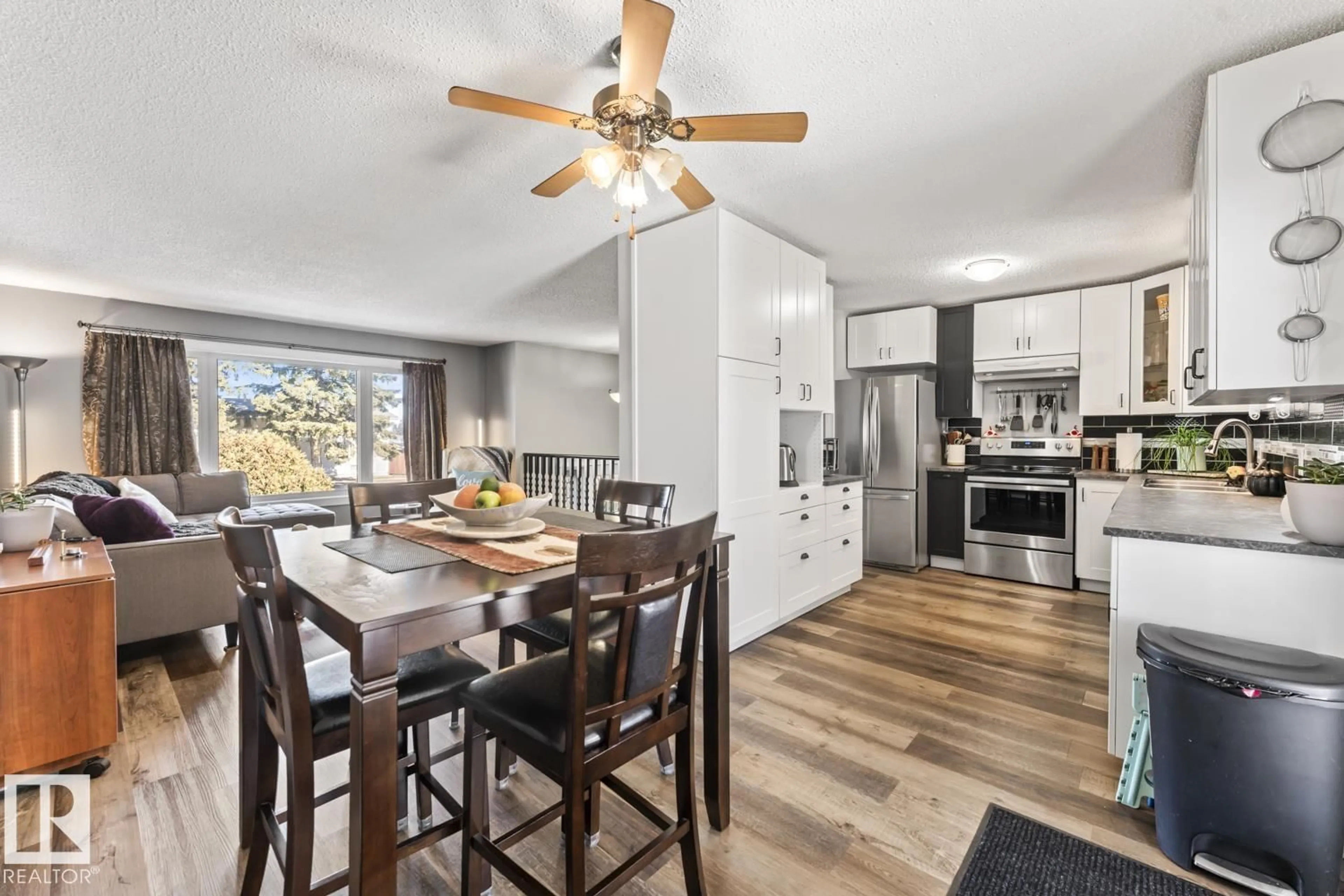 Open concept kitchen, wood/laminate floor for 1009 15 AV, Cold Lake Alberta T9M1J5