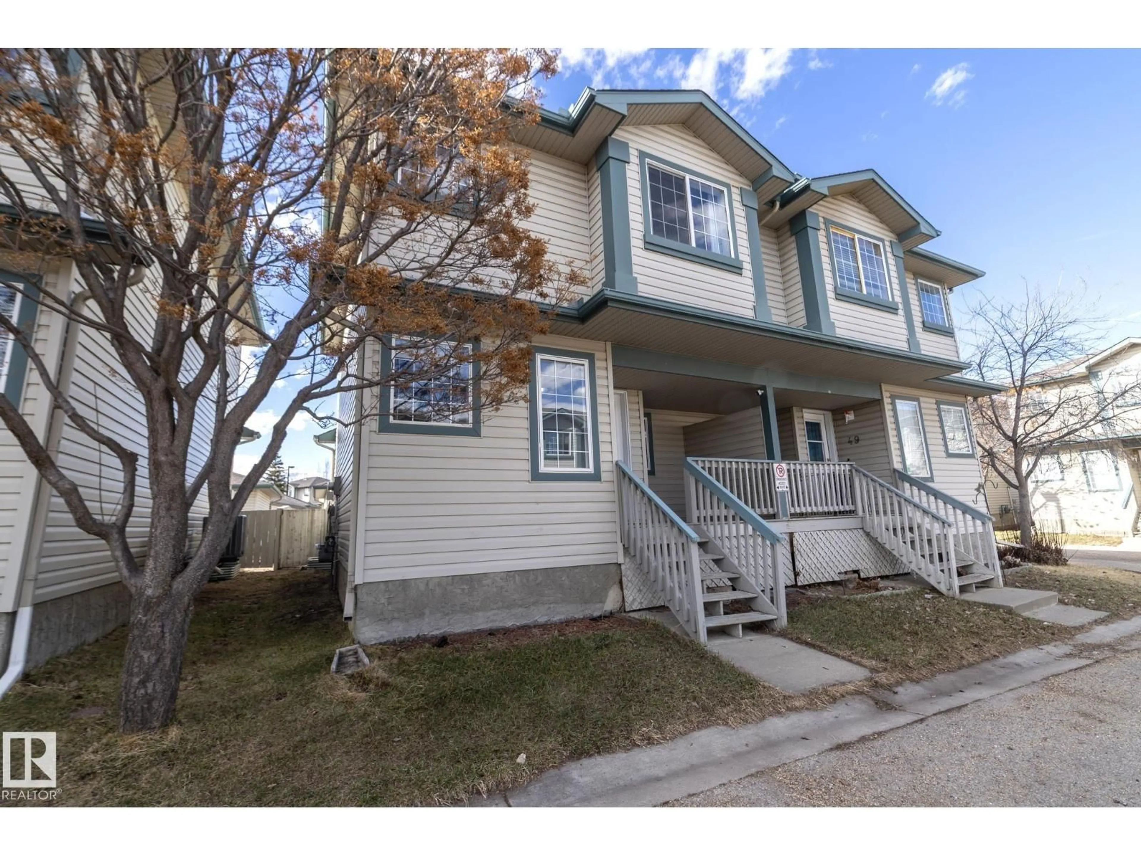 Home with vinyl exterior material, street for 14803 - 50 MILLER BV, Edmonton Alberta T5Y3A4