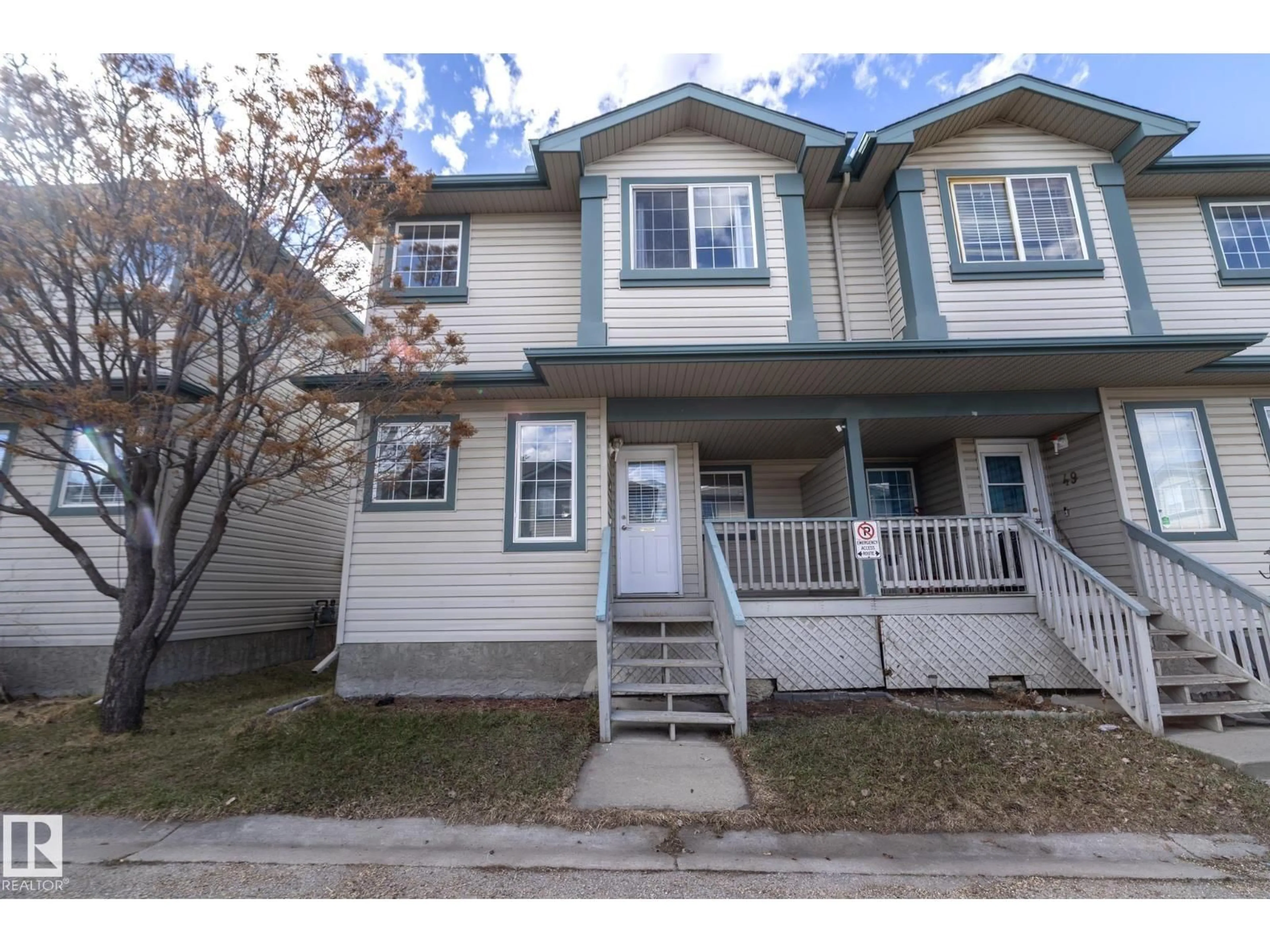 Home with vinyl exterior material, street for 14803 - 50 MILLER BV, Edmonton Alberta T5Y3A4