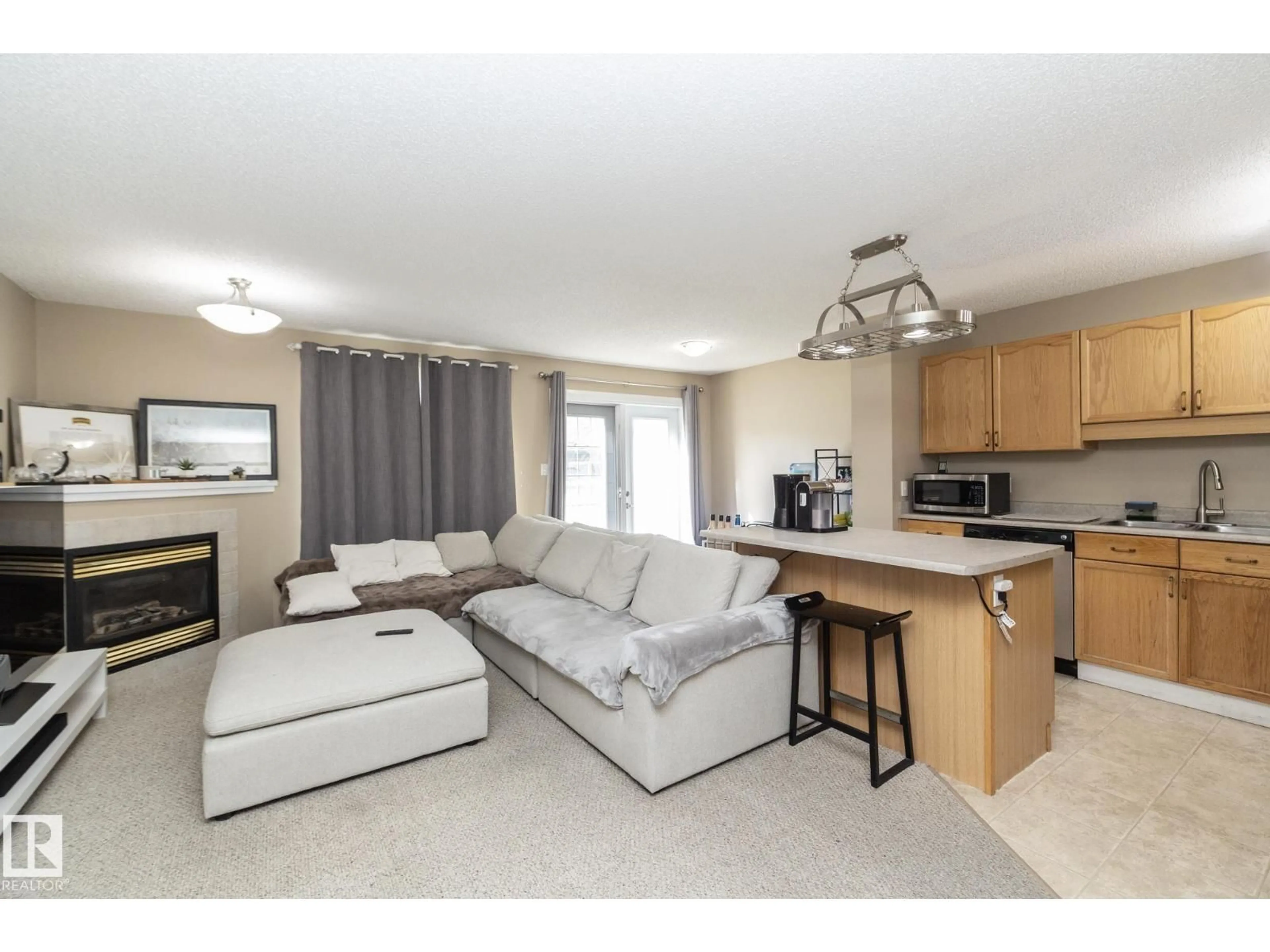 Living room with furniture, unknown for 14803 - 50 MILLER BV, Edmonton Alberta T5Y3A4