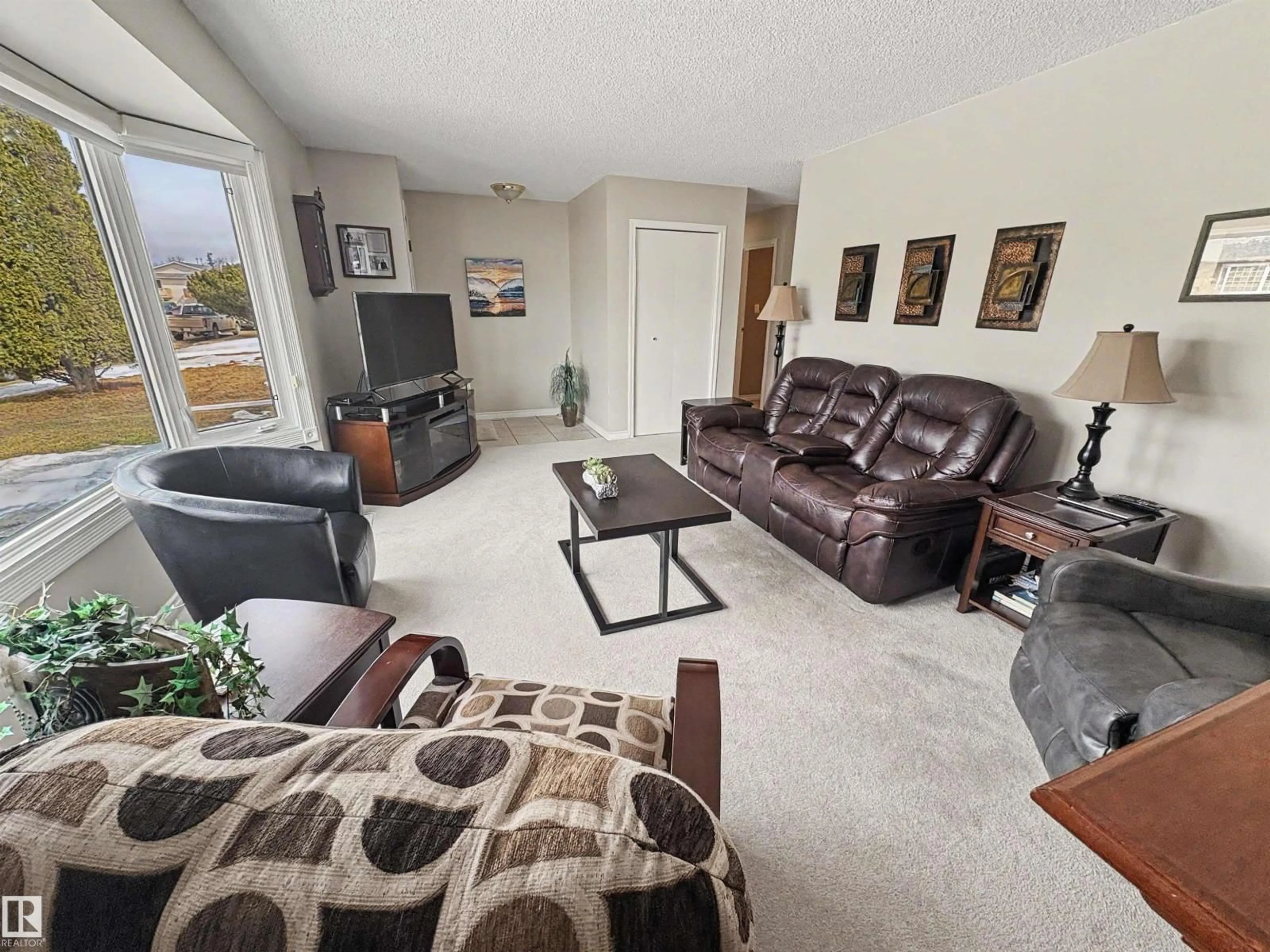 Living room with furniture, unknown for 4608 41 AV, Bonnyville Town Alberta T9N1P8
