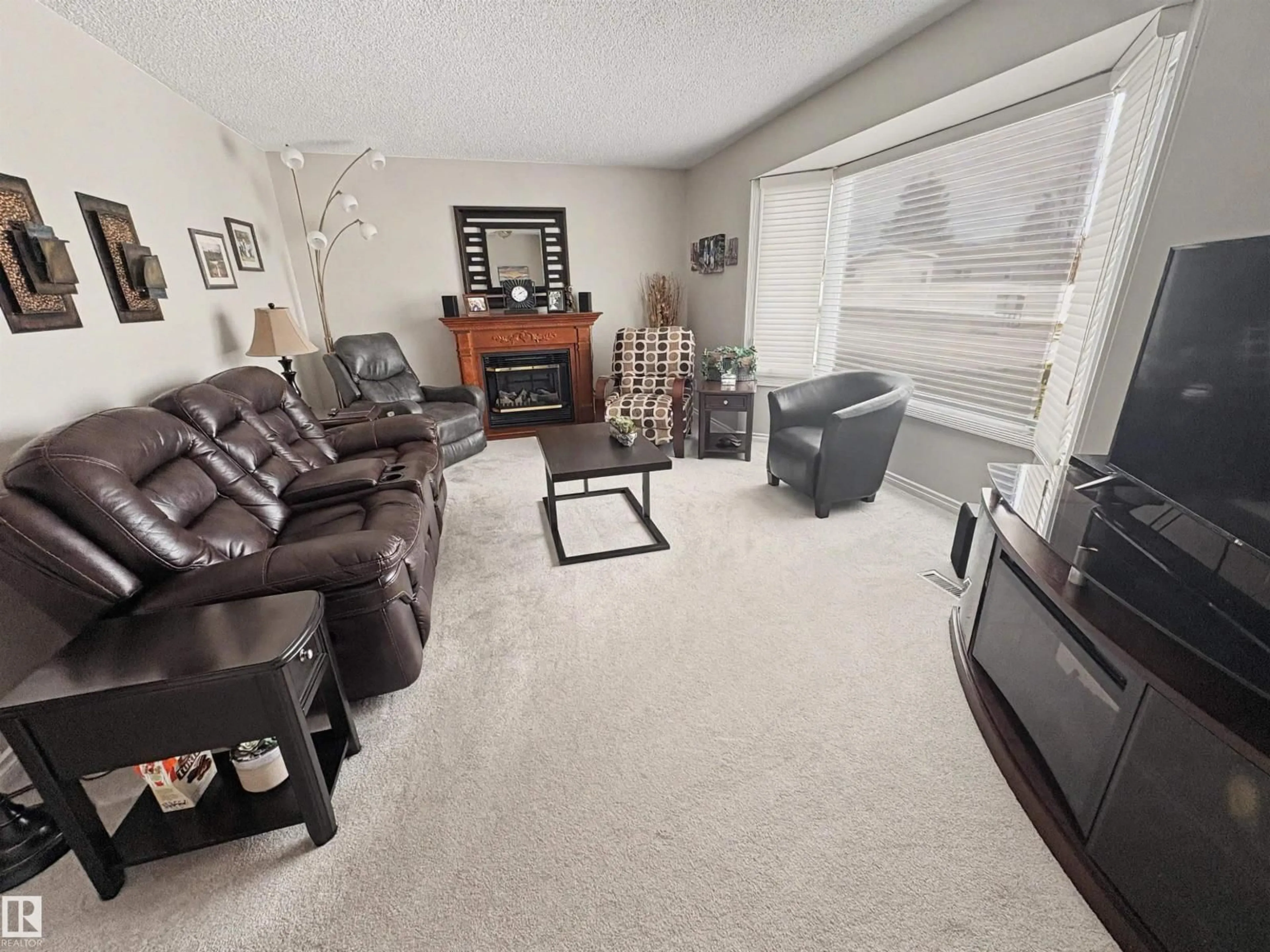 Living room with furniture, unknown for 4608 41 AV, Bonnyville Town Alberta T9N1P8