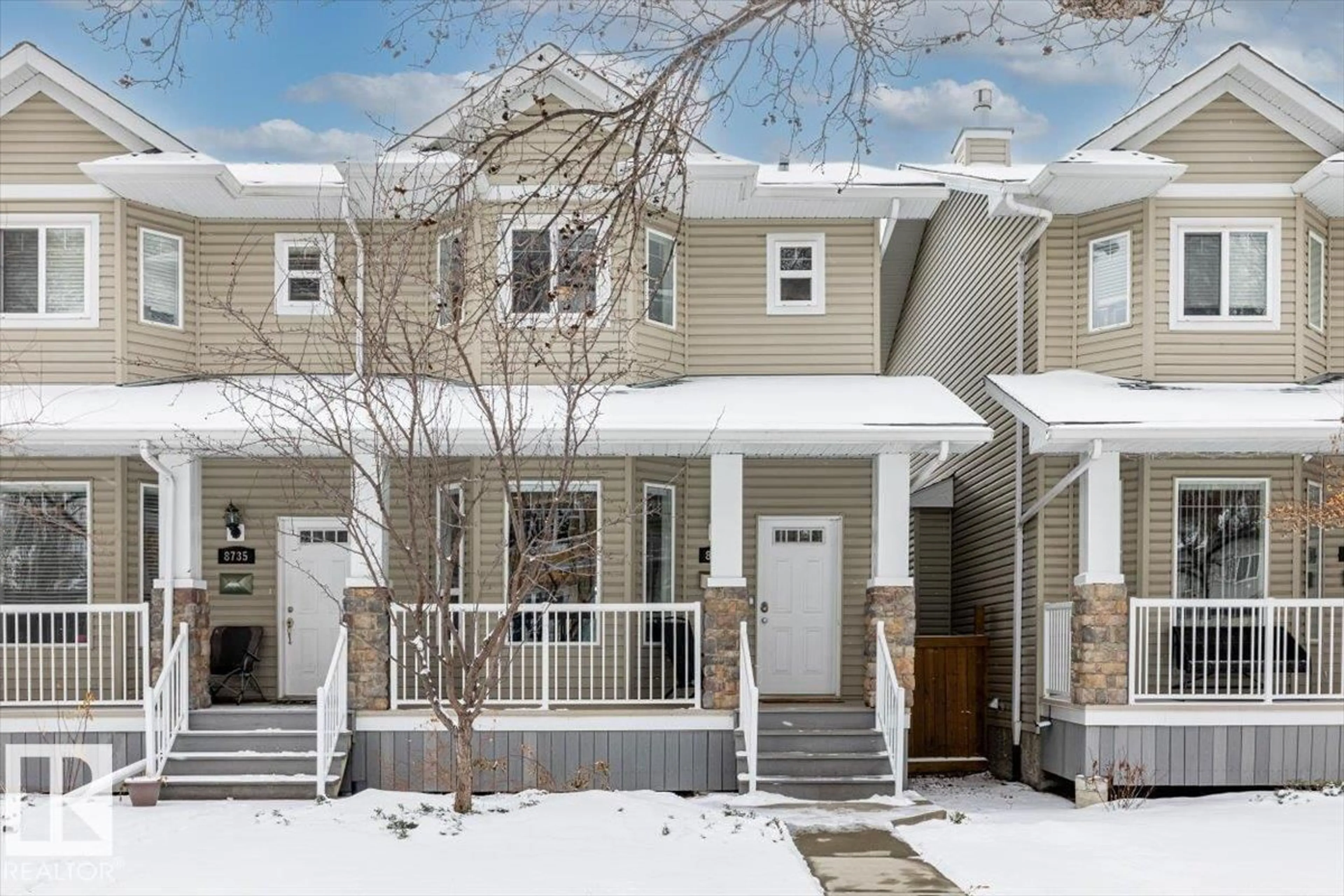 Home with vinyl exterior material, street for 8737 83 AV, Edmonton Alberta T6C1B2