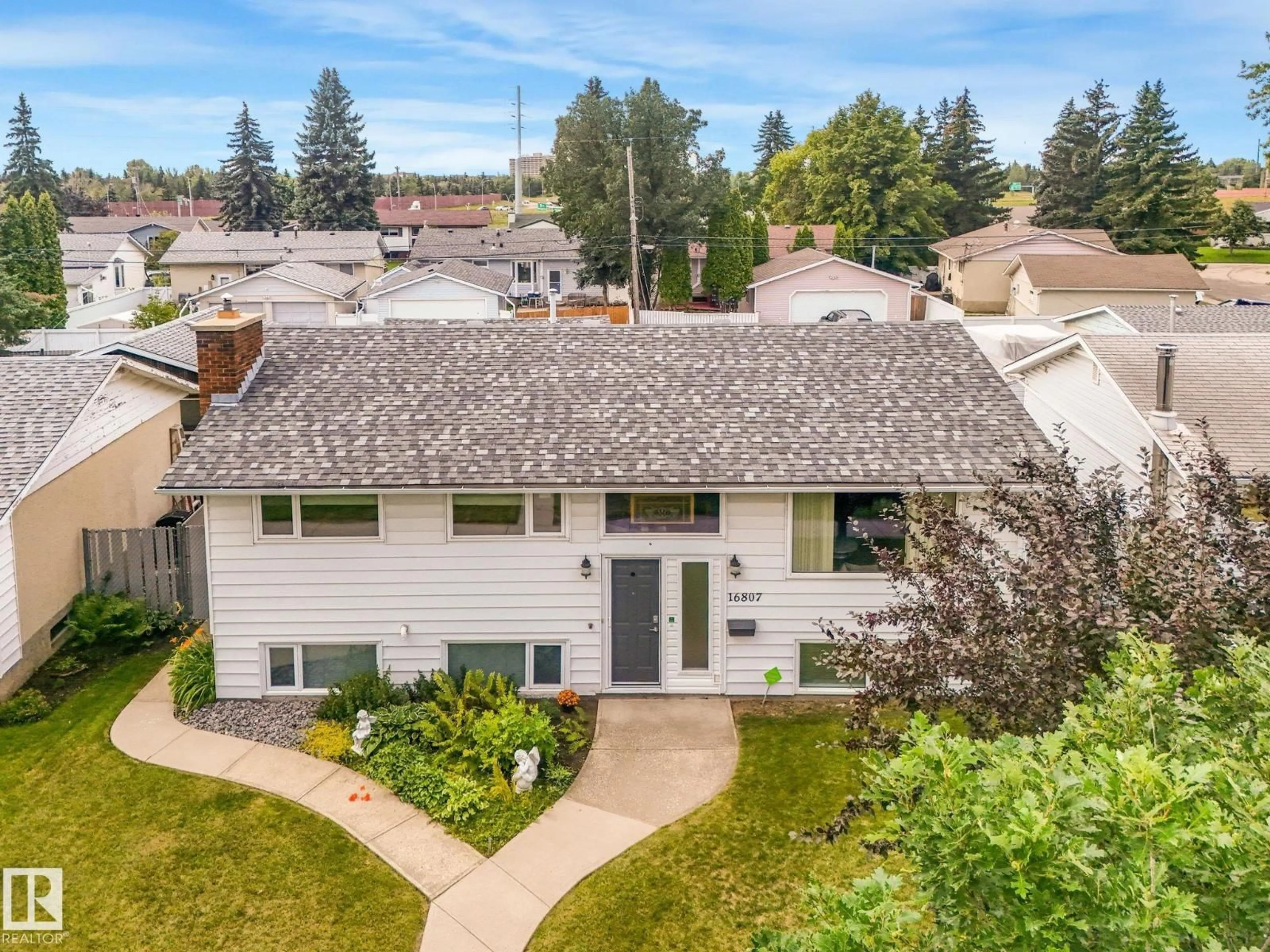 A pic from outside/outdoor area/front of a property/back of a property/a pic from drone, street for 16807 80 AV, Edmonton Alberta T5R3N1