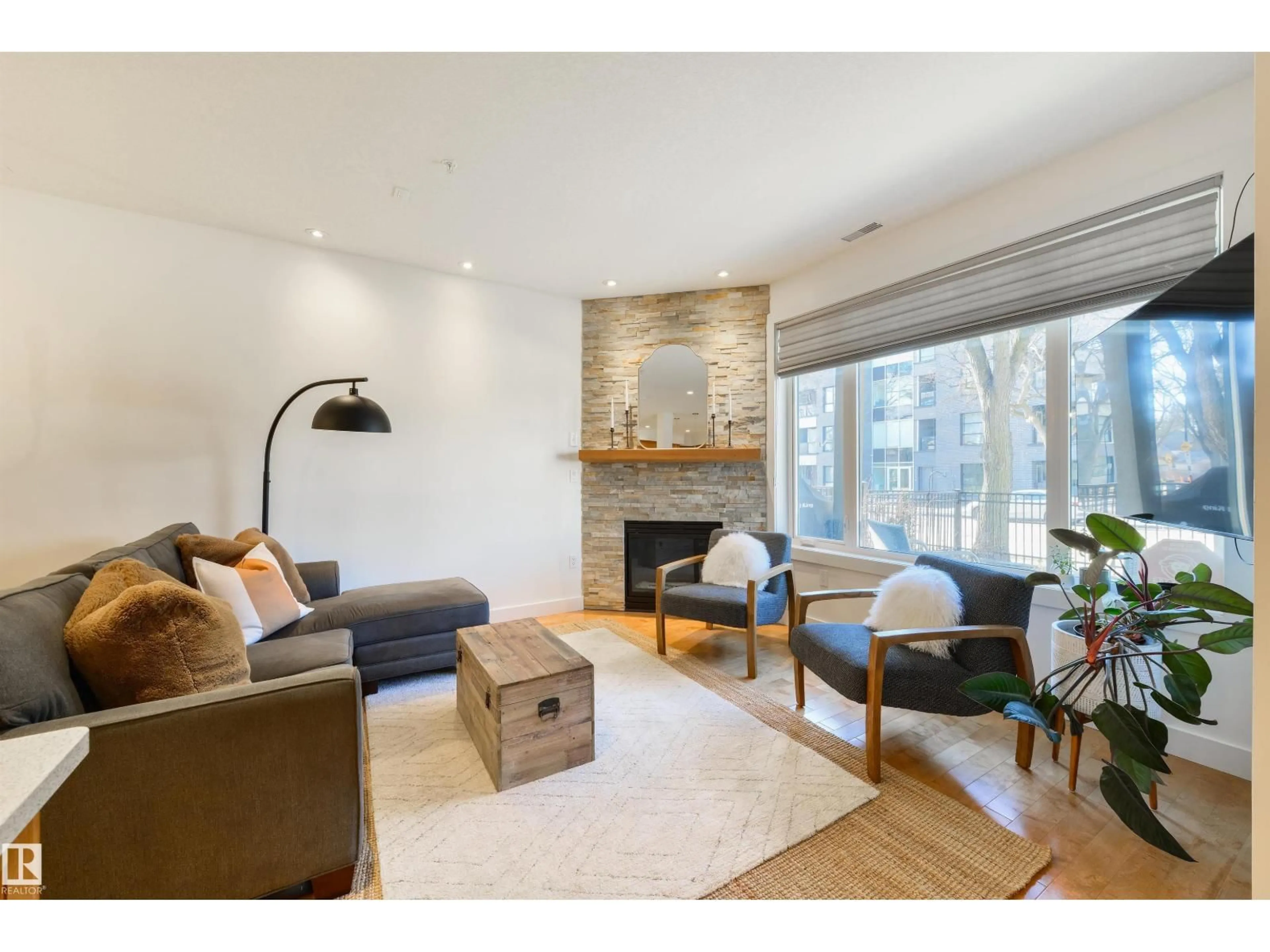 Living room with furniture, wood/laminate floor for #7 - 11518 76 AV, Edmonton Alberta T6G0K7