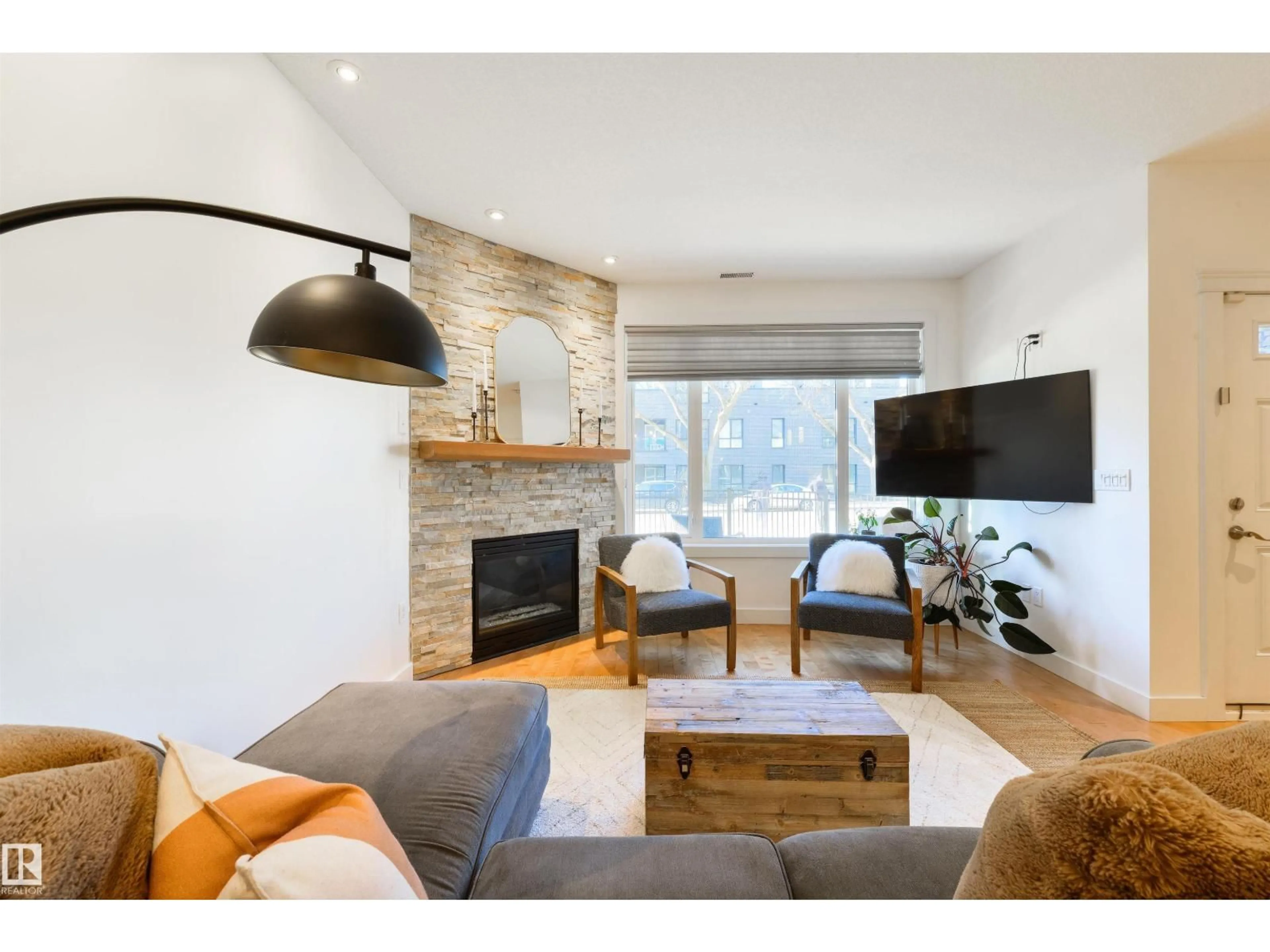 Living room with furniture, wood/laminate floor for #7 - 11518 76 AV, Edmonton Alberta T6G0K7