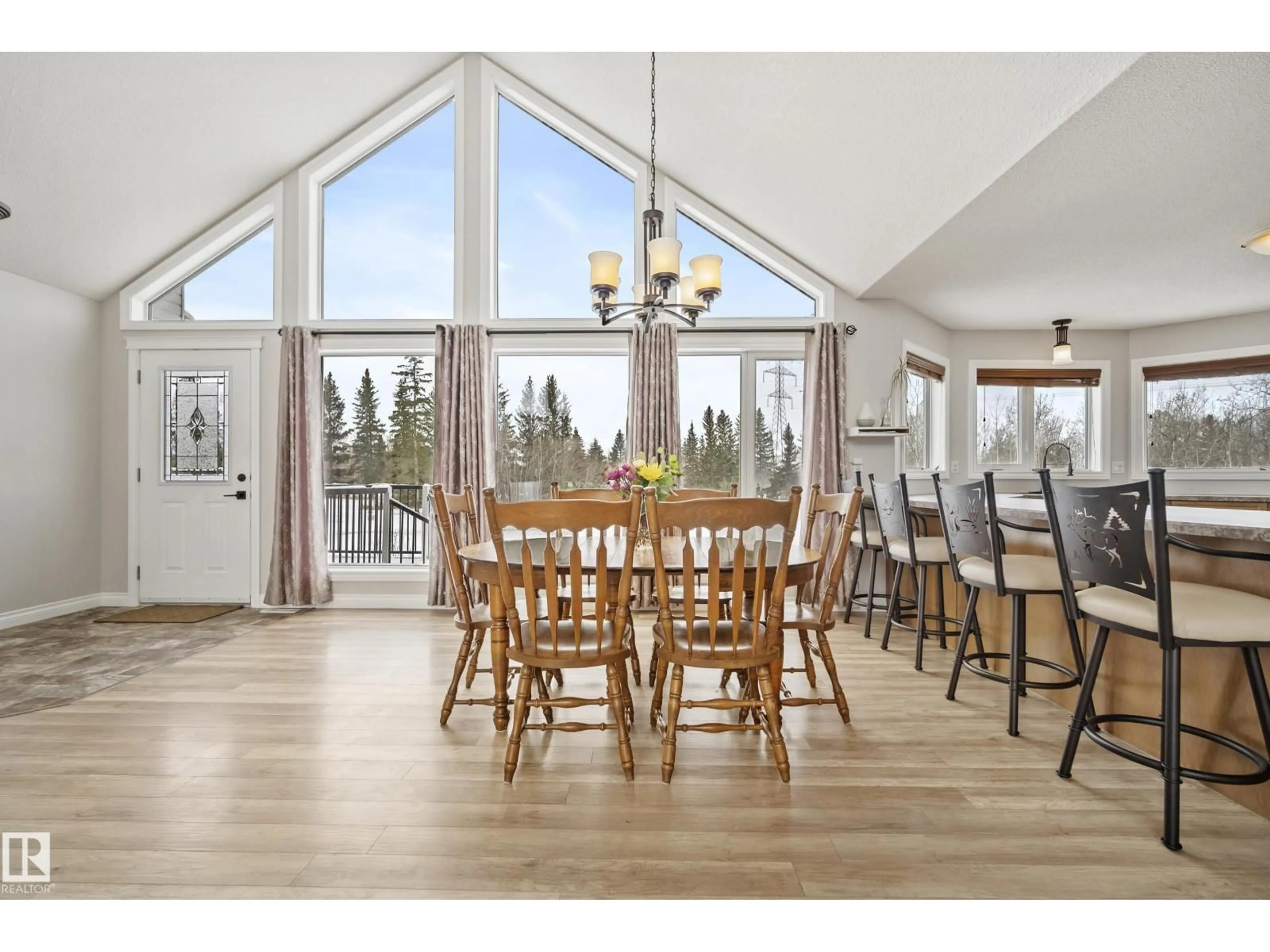 Dining room, wood/laminate floor for 1290 50242 RGE RD 244, Rural Leduc County Alberta T4X0P4