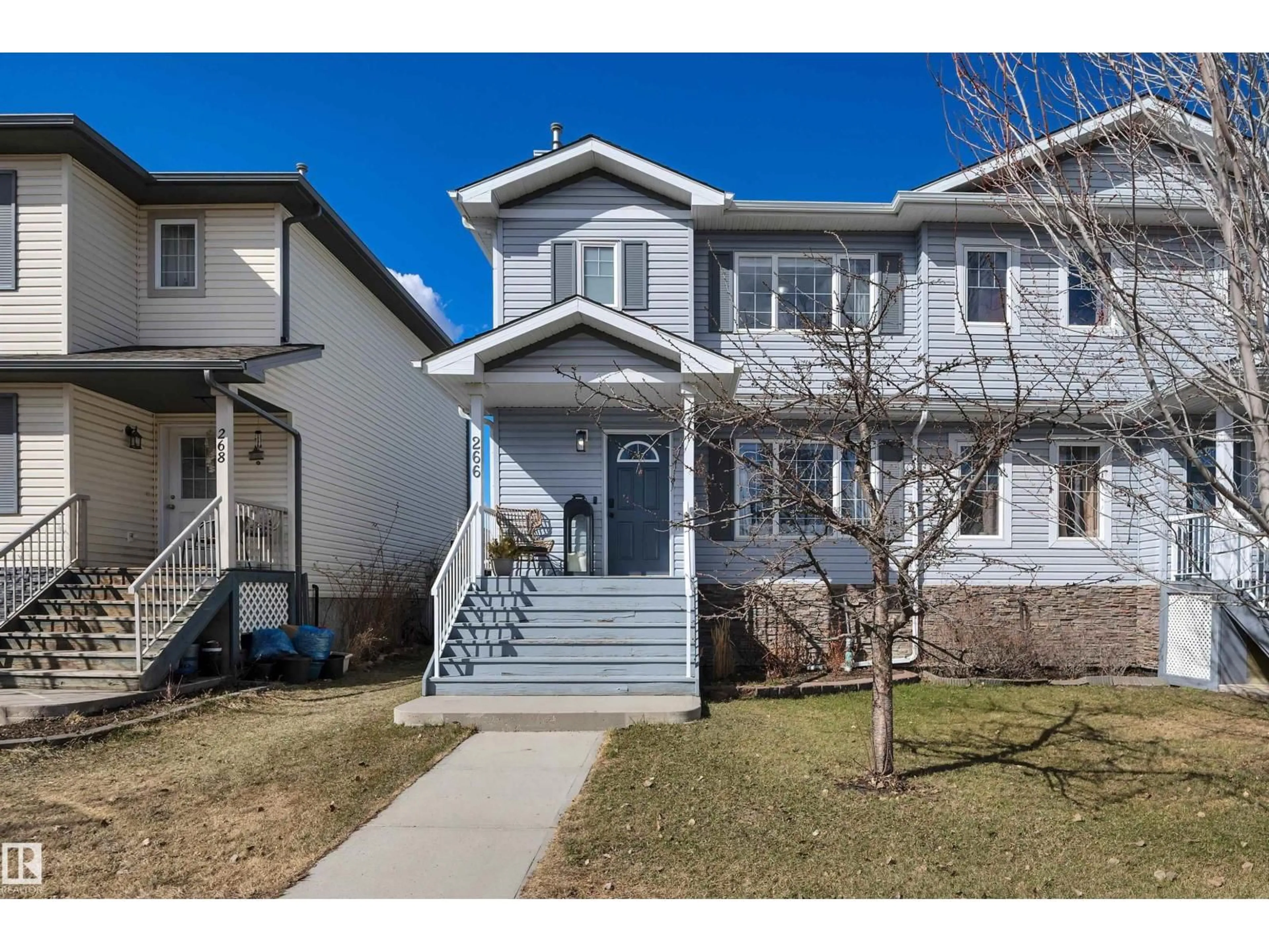 Home with vinyl exterior material, street for 266 AVENA CI, Leduc Alberta T9E0L9