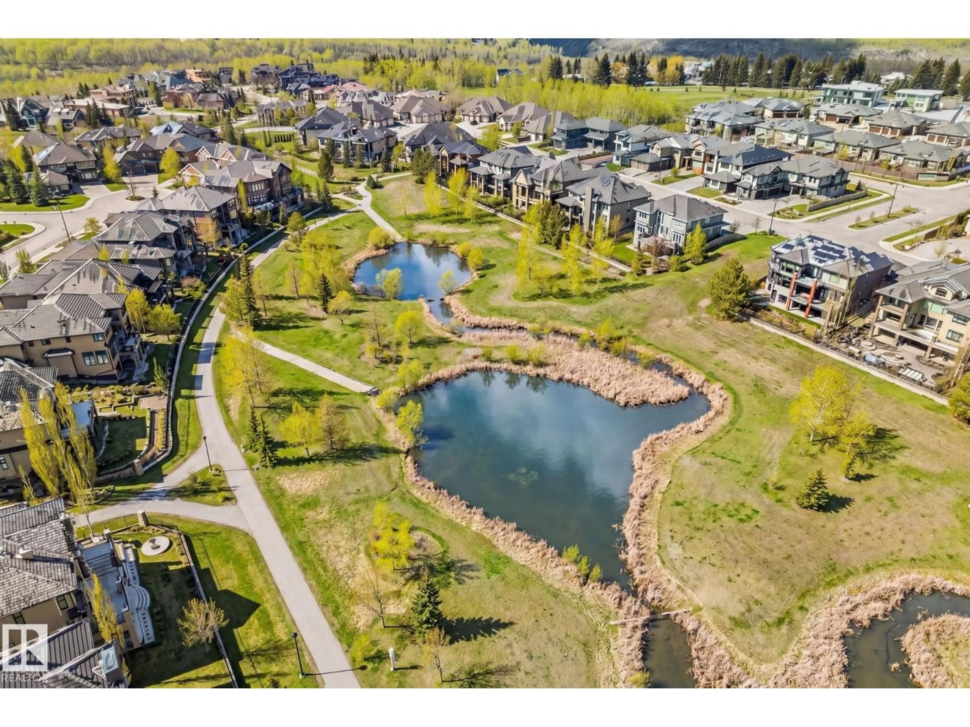 A pic from outside/outdoor area/front of a property/back of a property/a pic from drone, water/lake/river/ocean view for 3048 WATSON LANDING LD, Edmonton Alberta T6W2G4