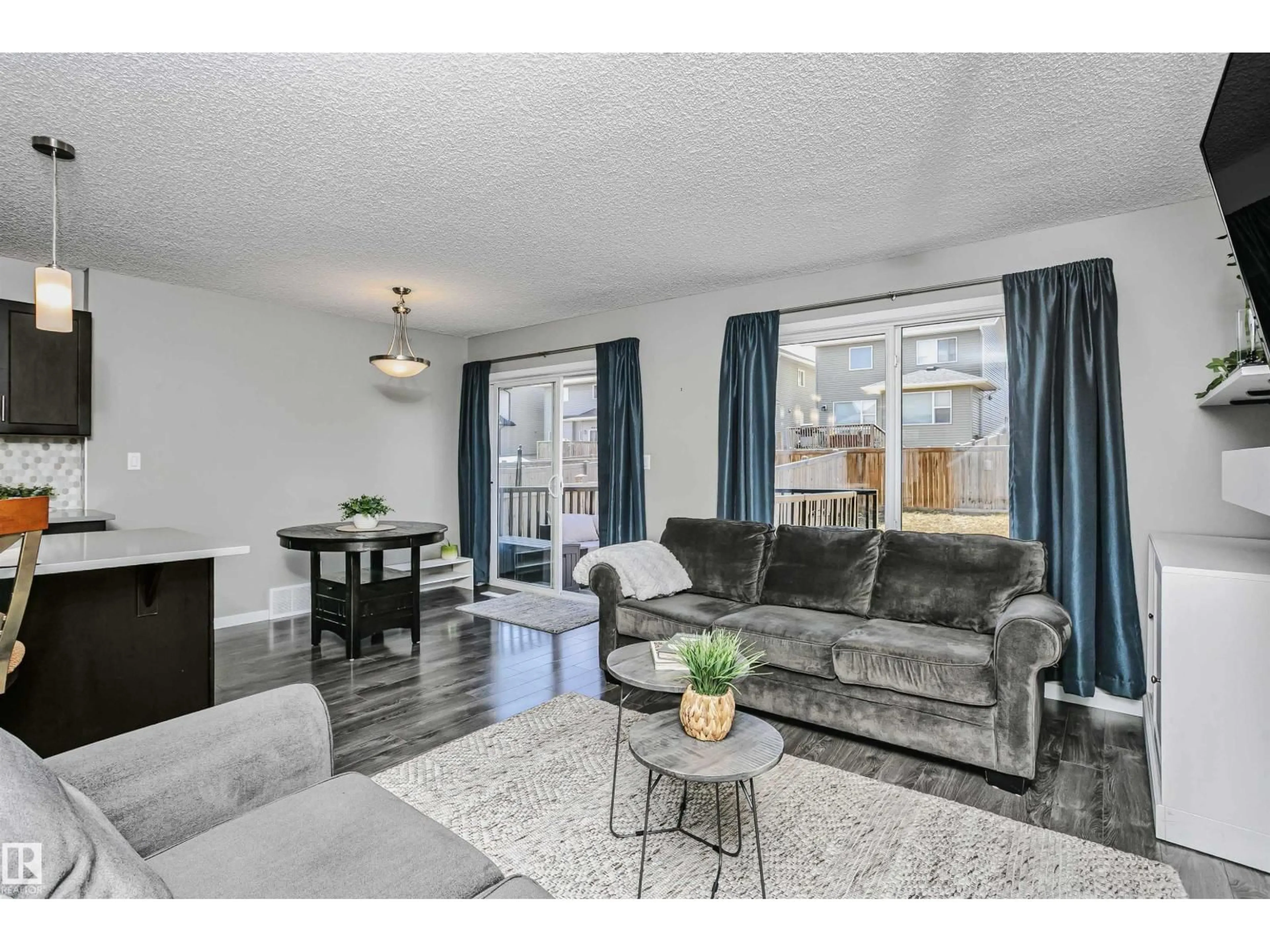 Living room with furniture, unknown for 7280 EDGEMONT WY, Edmonton Alberta T6M0S1