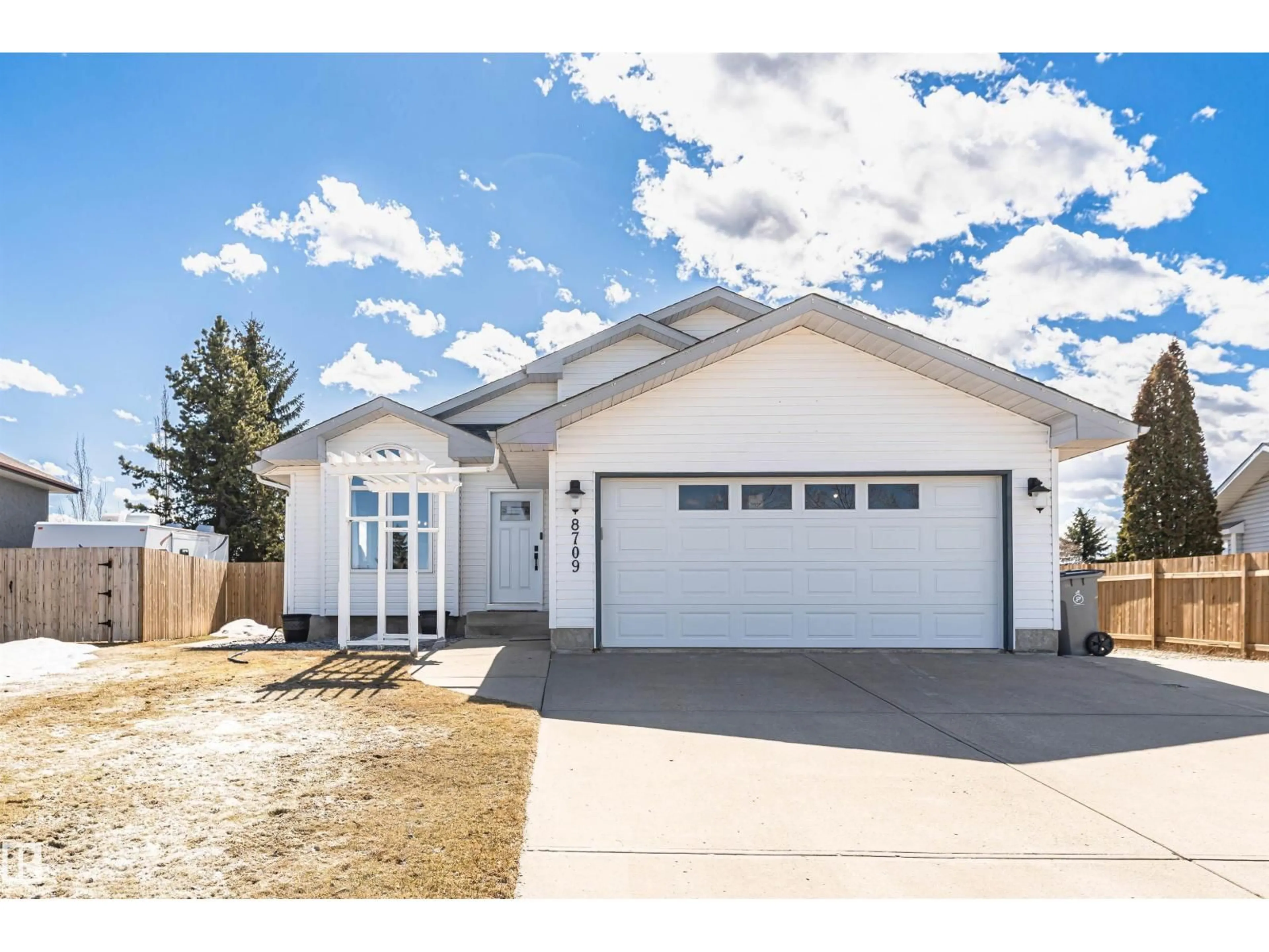 Home with vinyl exterior material, street for 8709 102 AV, Morinville Alberta T8R1B7
