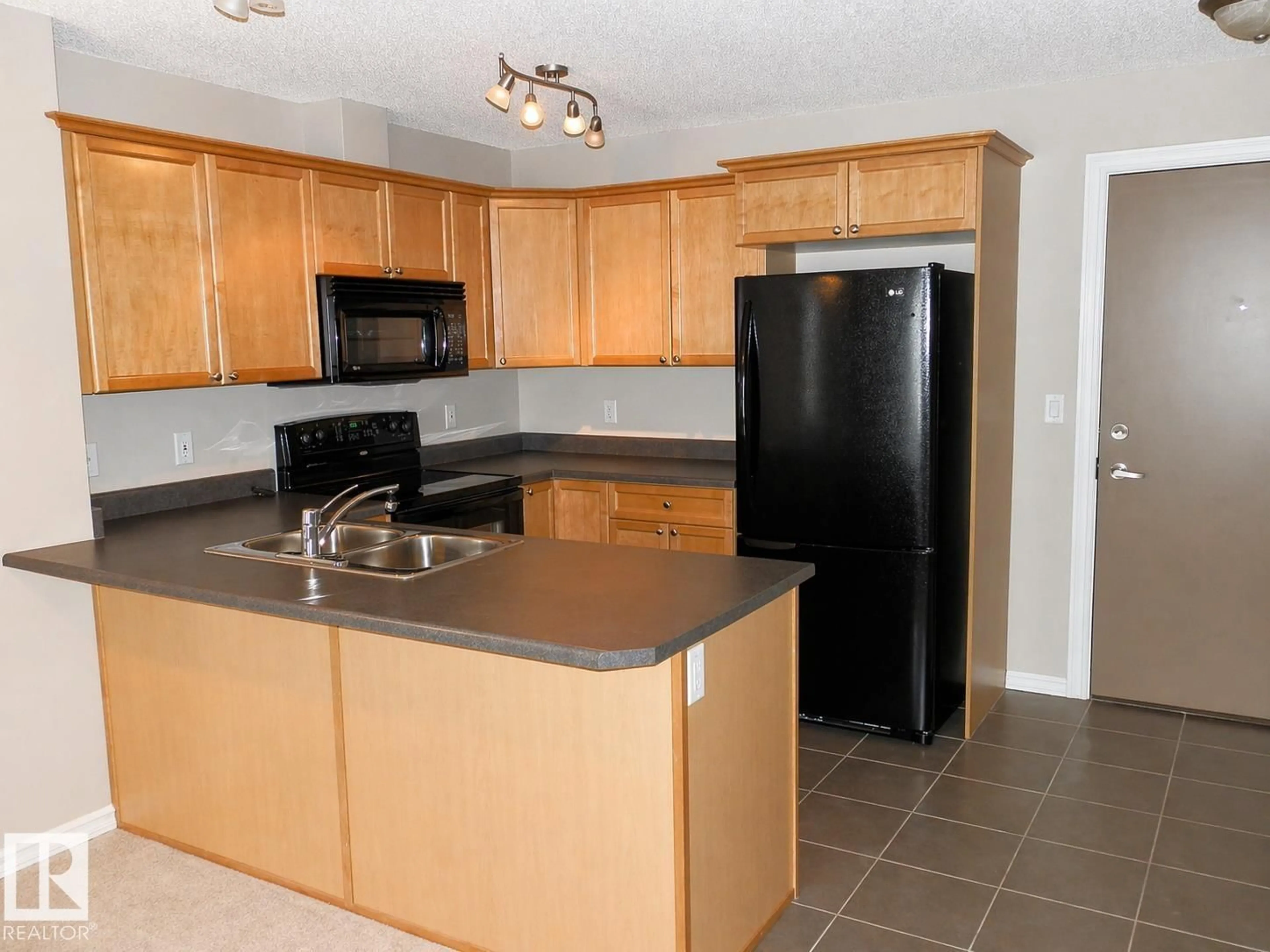 Standard kitchen, unknown for #417 - 4403 23 ST NW, Edmonton Alberta T6T0E4